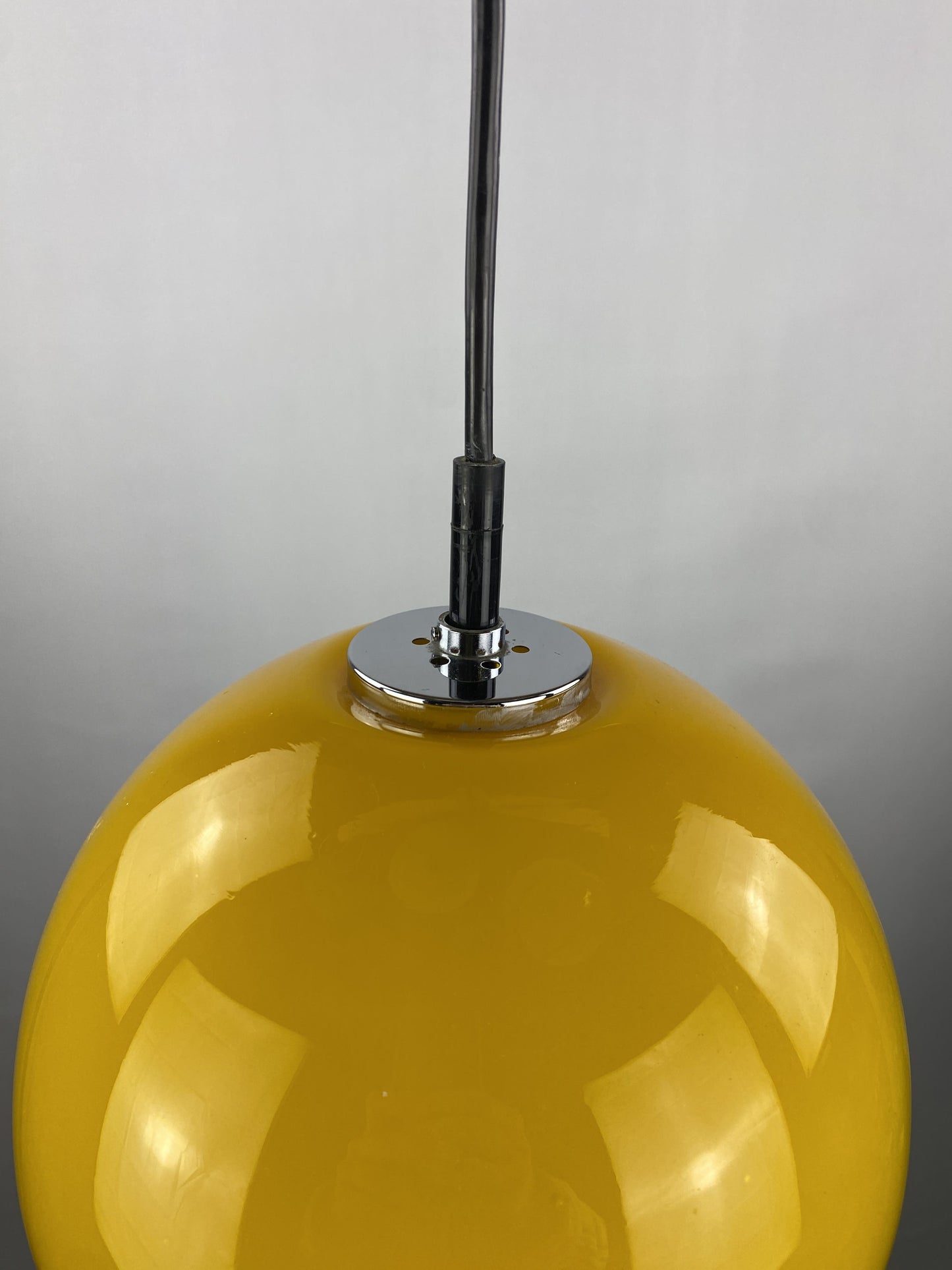 Yellow glass globe pendant light by Peill and Putzler 1960