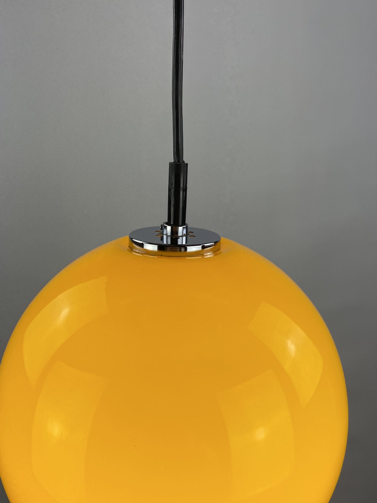 Yellow glass globe pendant light by Peill and Putzler 1960