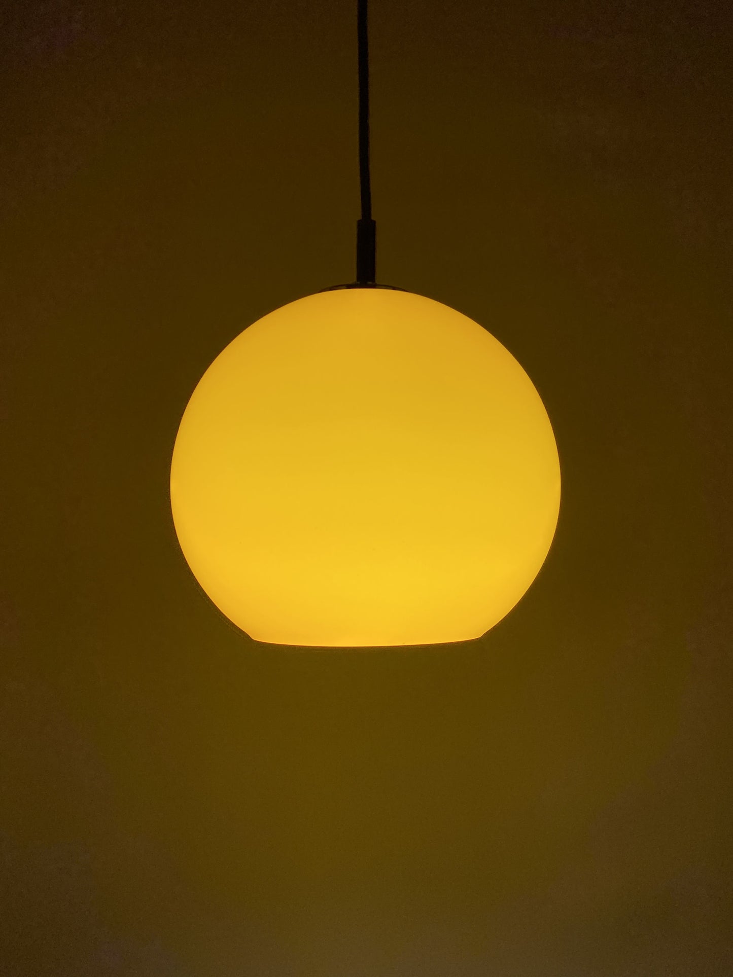 Yellow glass globe pendant light by Peill and Putzler 1960