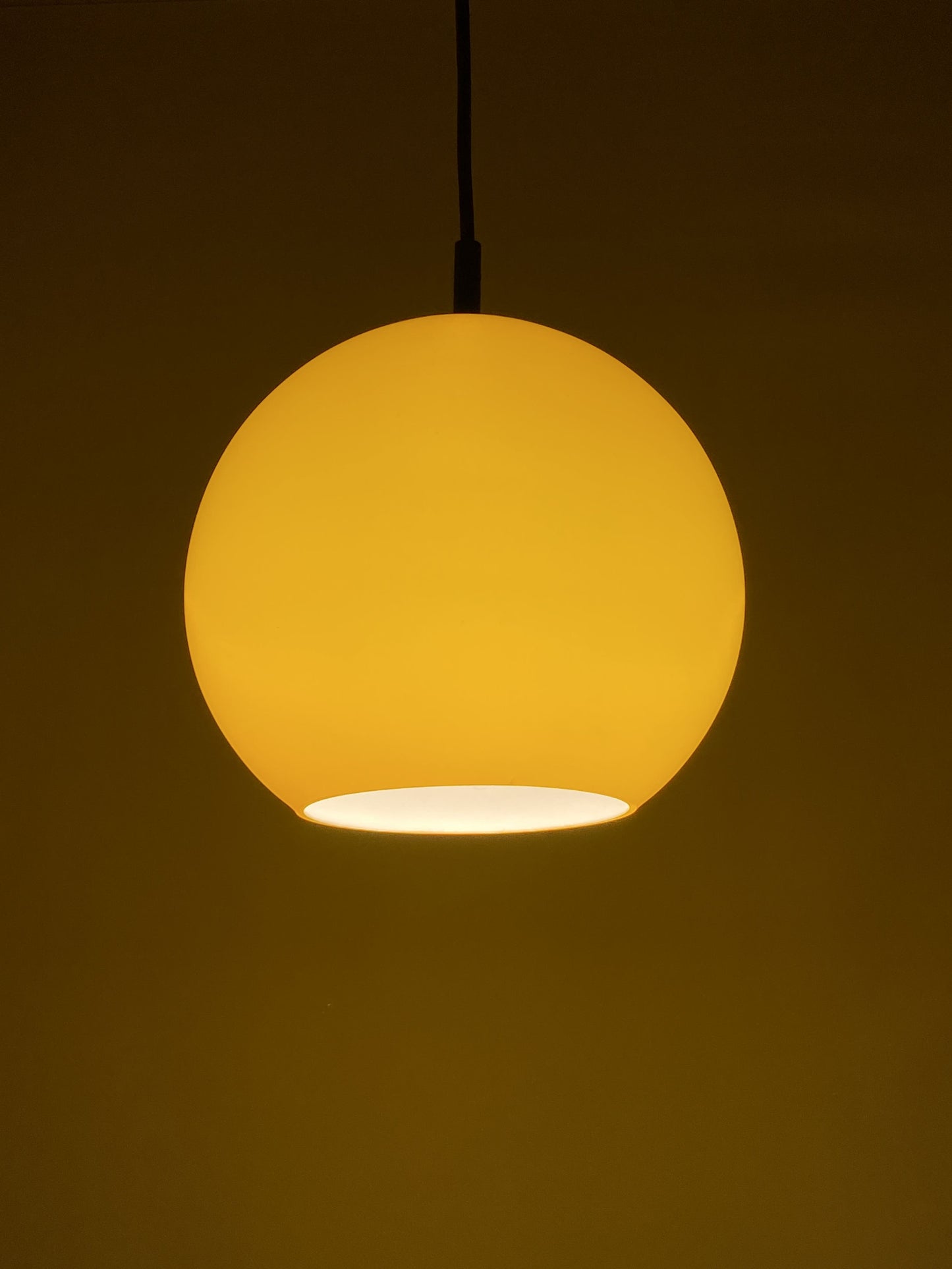 Yellow glass globe pendant light by Peill and Putzler 1960