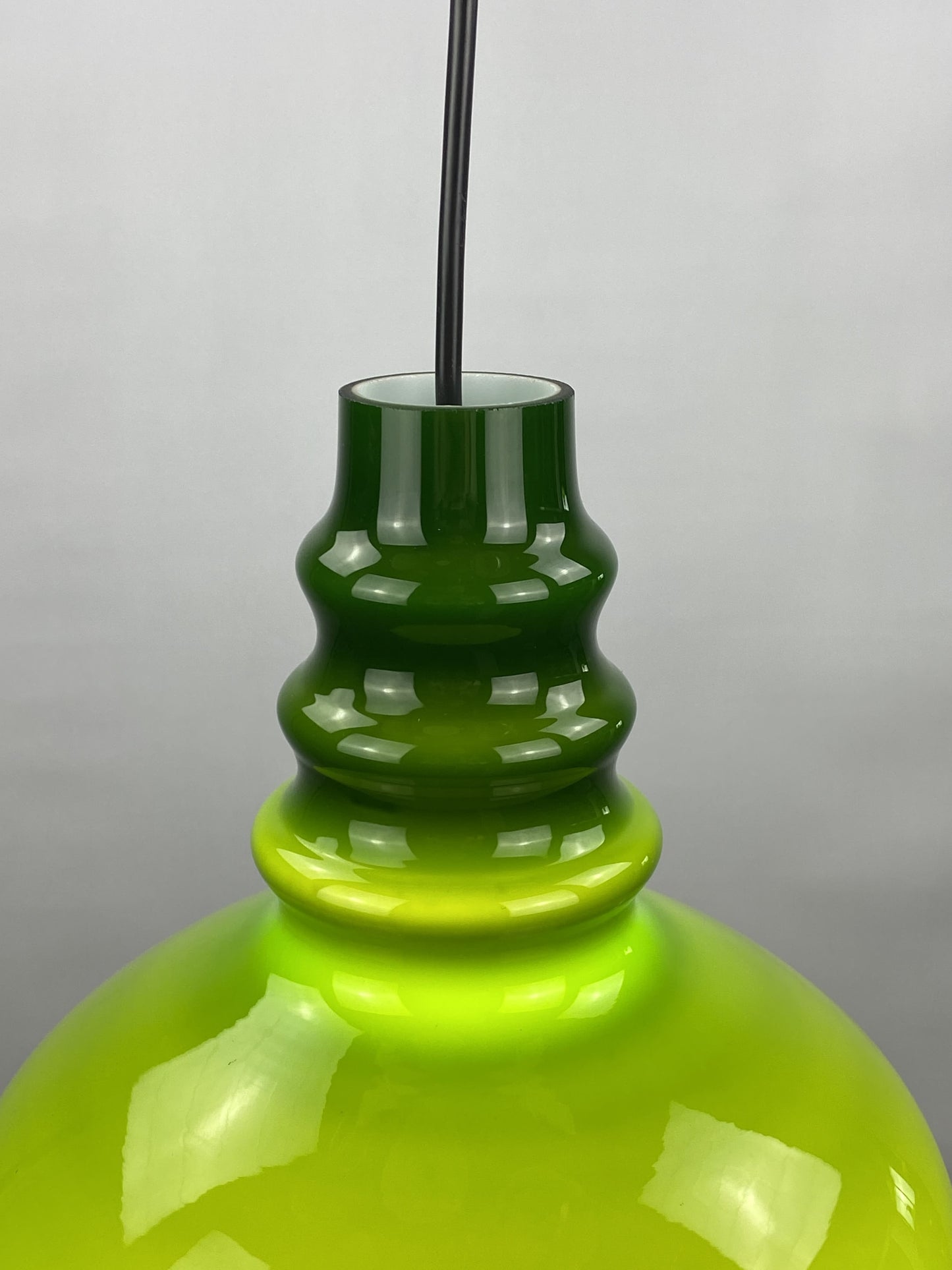 Rare dark green midcentury glass orange pendant light by Peill & Putzler 1960