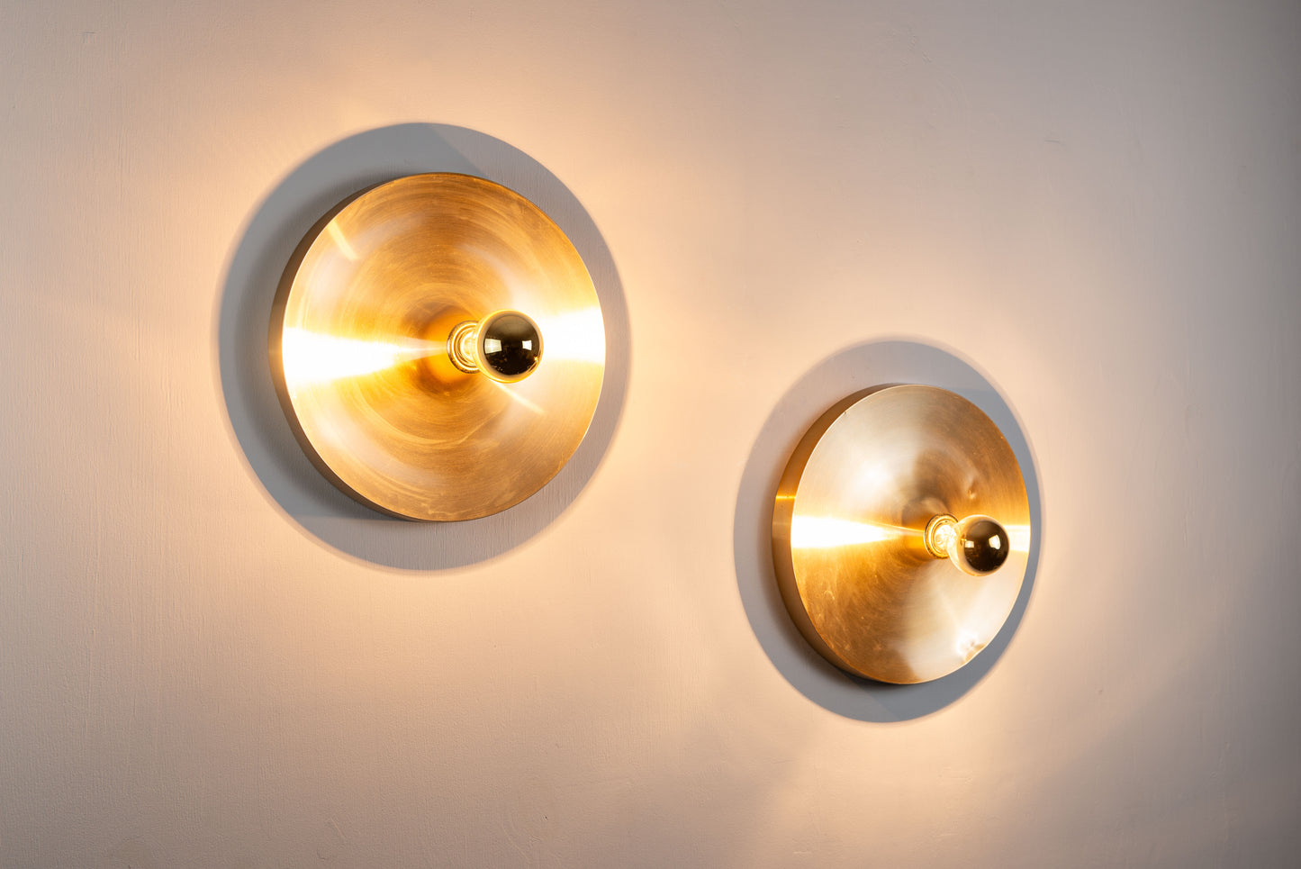 Pair of Honsel Disc sconces by Charlotte Perriand for Les Arcs (35cm)