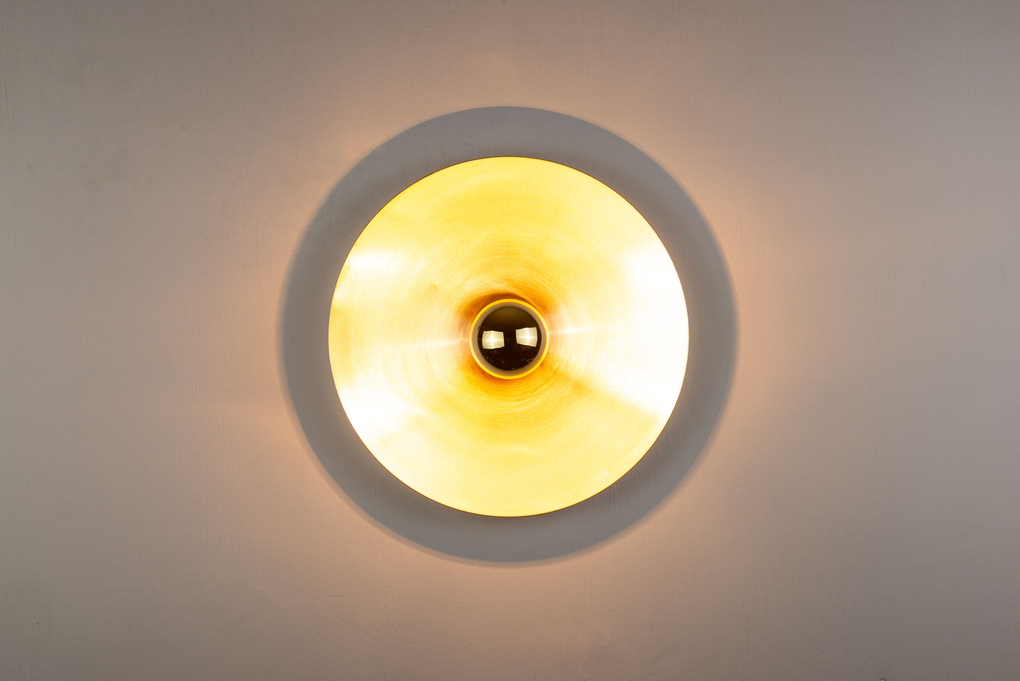 Pair of Honsel Disc sconces by Charlotte Perriand for Les Arcs (35cm)