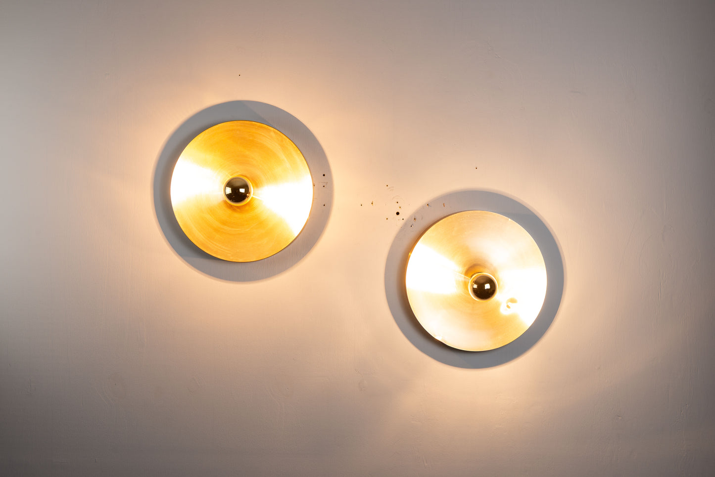 Pair of Honsel Disc sconces by Charlotte Perriand for Les Arcs (35cm)