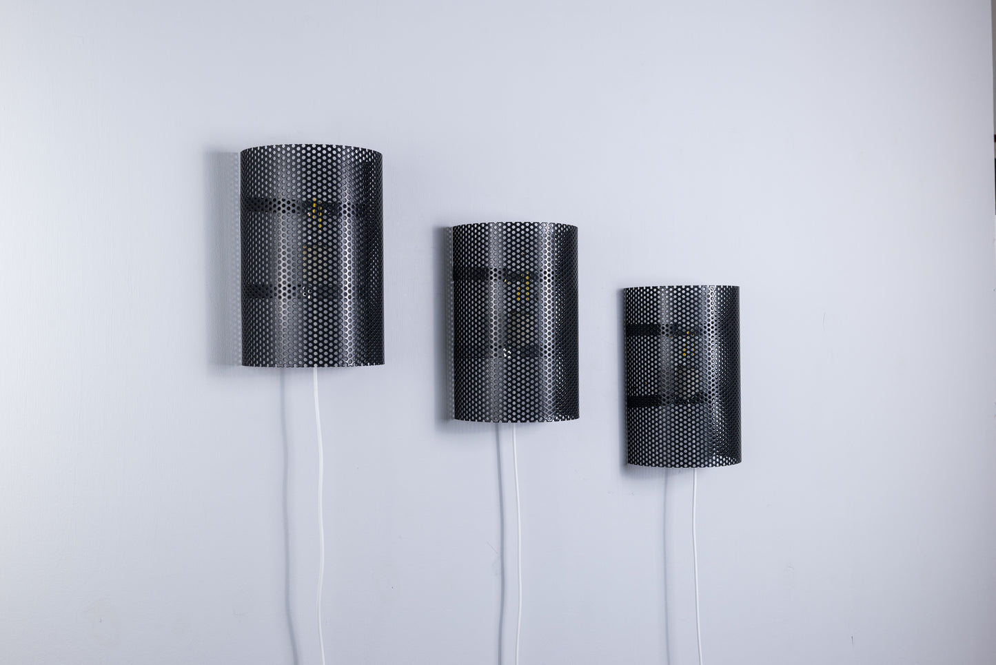 Set of 3 metal black laquered wall lamps from Holland 1970