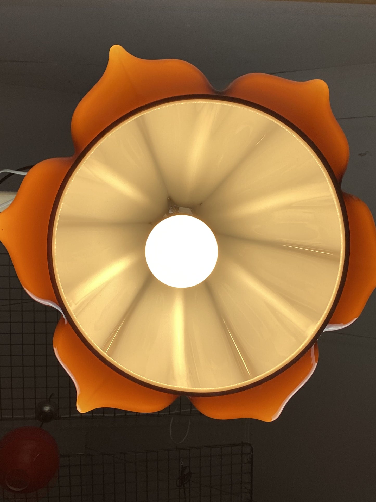 Flower shaped brown / caramel glass pendant light by Peill and Putzler 1960