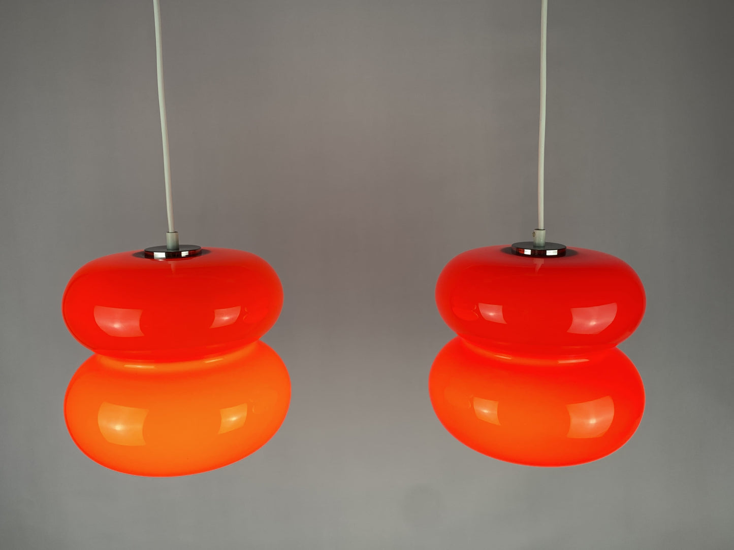 Set of two red pendant lights by Herwig and Frank Sterckx Glasfabriek De Rupel 1970