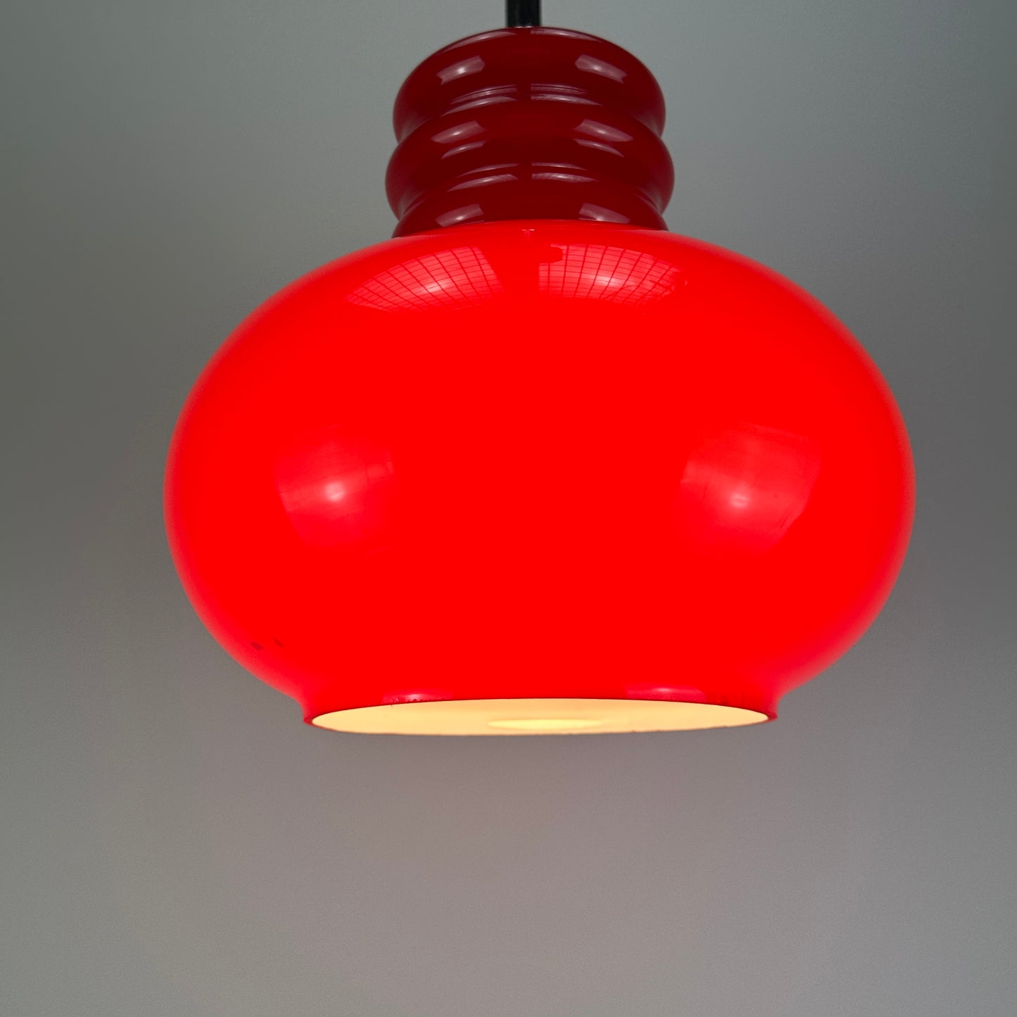 Red glass pendant light by Peill and Putzler 1960