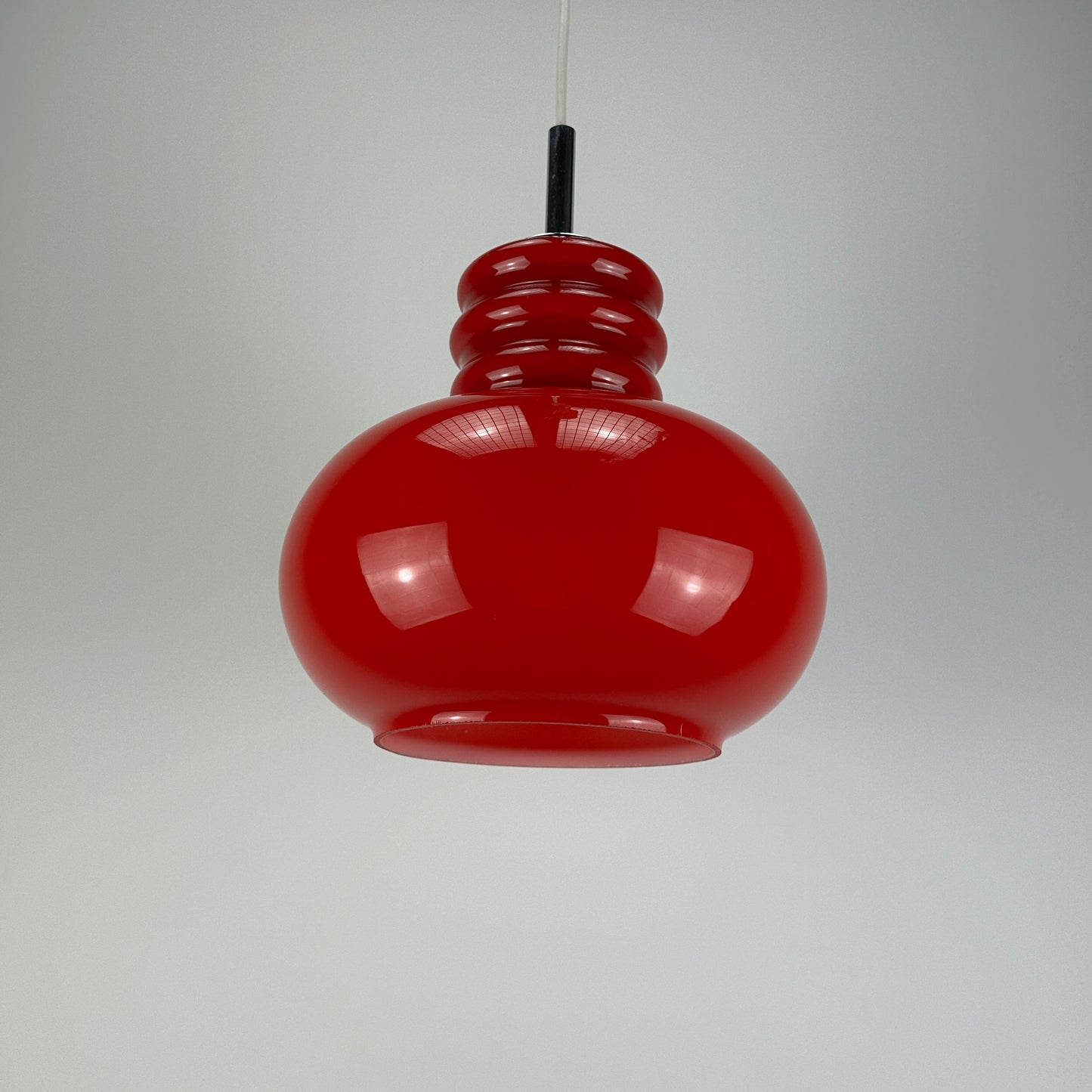 Red glass pendant light by Peill and Putzler 1960