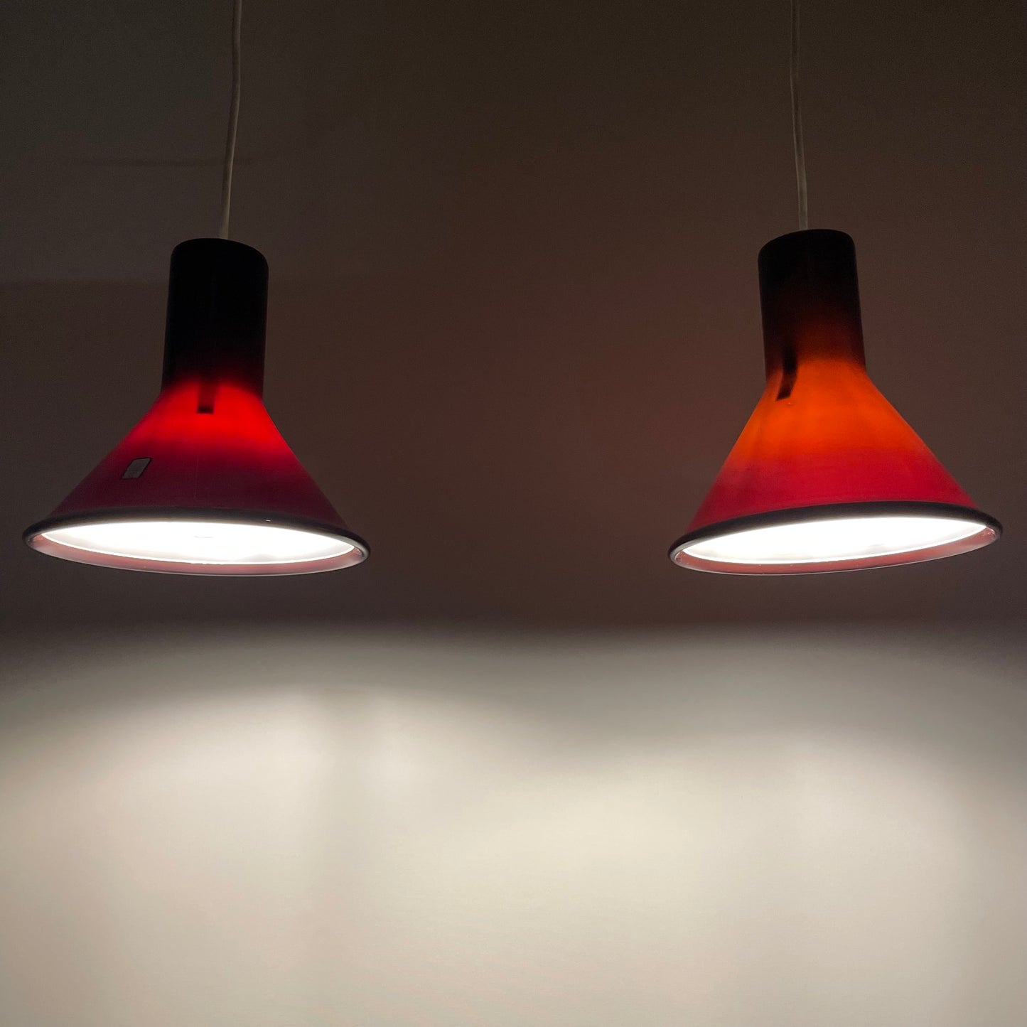 pair of aubergine glass P&T MINI pendant lights
Michael Bang for Holmegaard 1970s lighting
mid-century modern Scandinavian lighting
vintage purple glass pendant lights
Holmegaard pendant lamps for sale