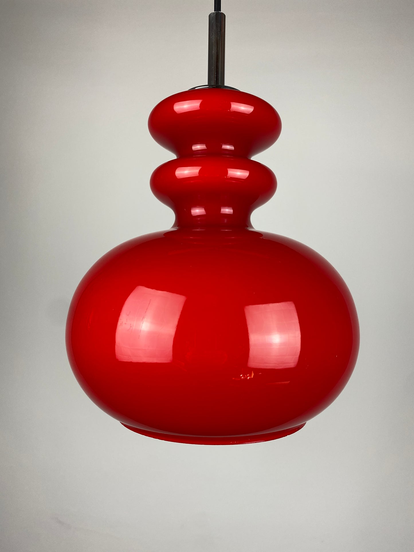 Red glass pendant light by Peill & Putzler, 1960
