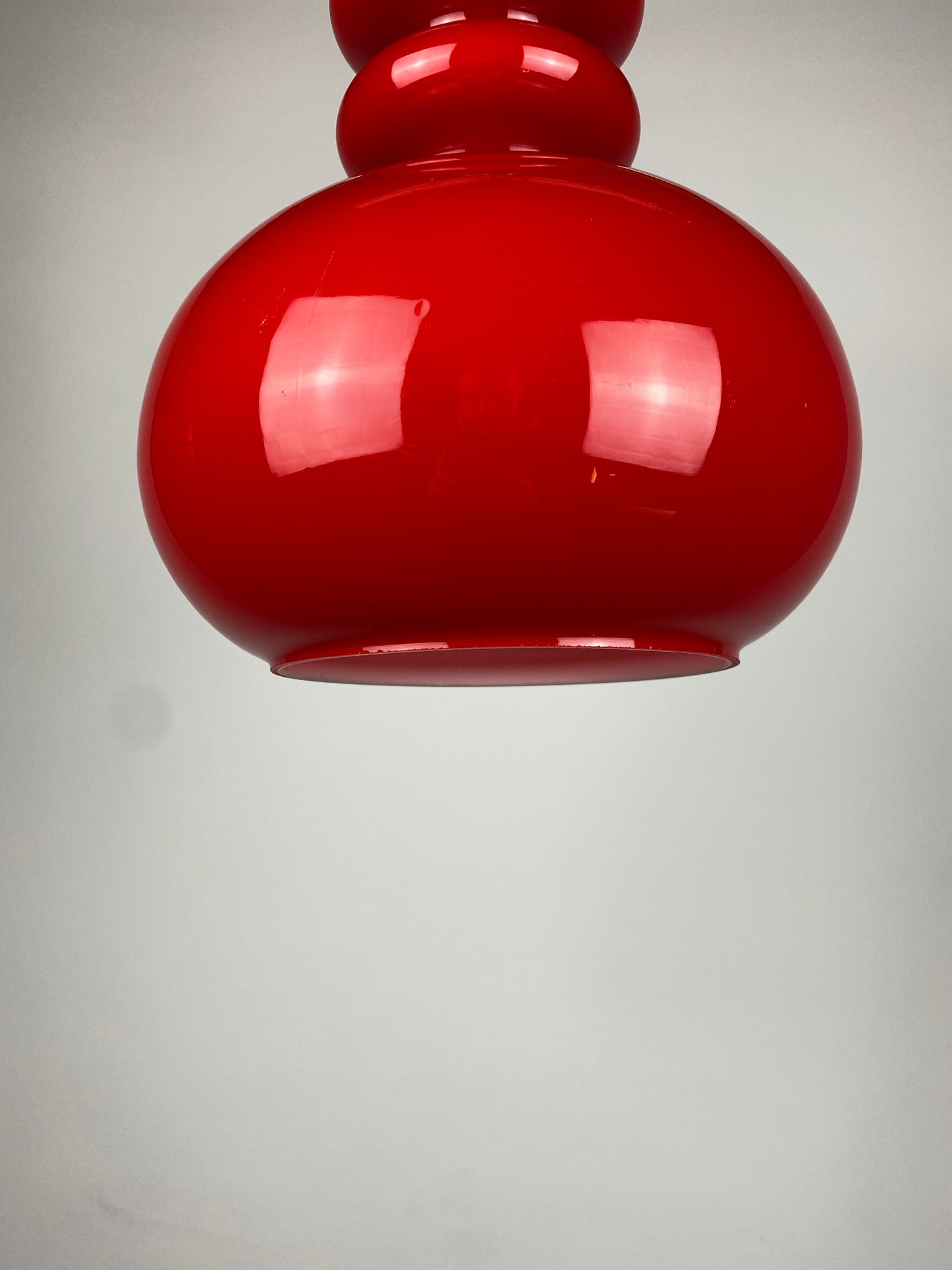 Red glass pendant light by Peill & Putzler, 1960