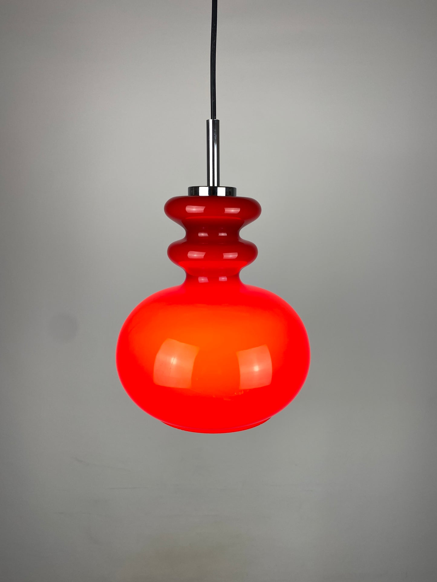 Red glass pendant light by Peill & Putzler, 1960