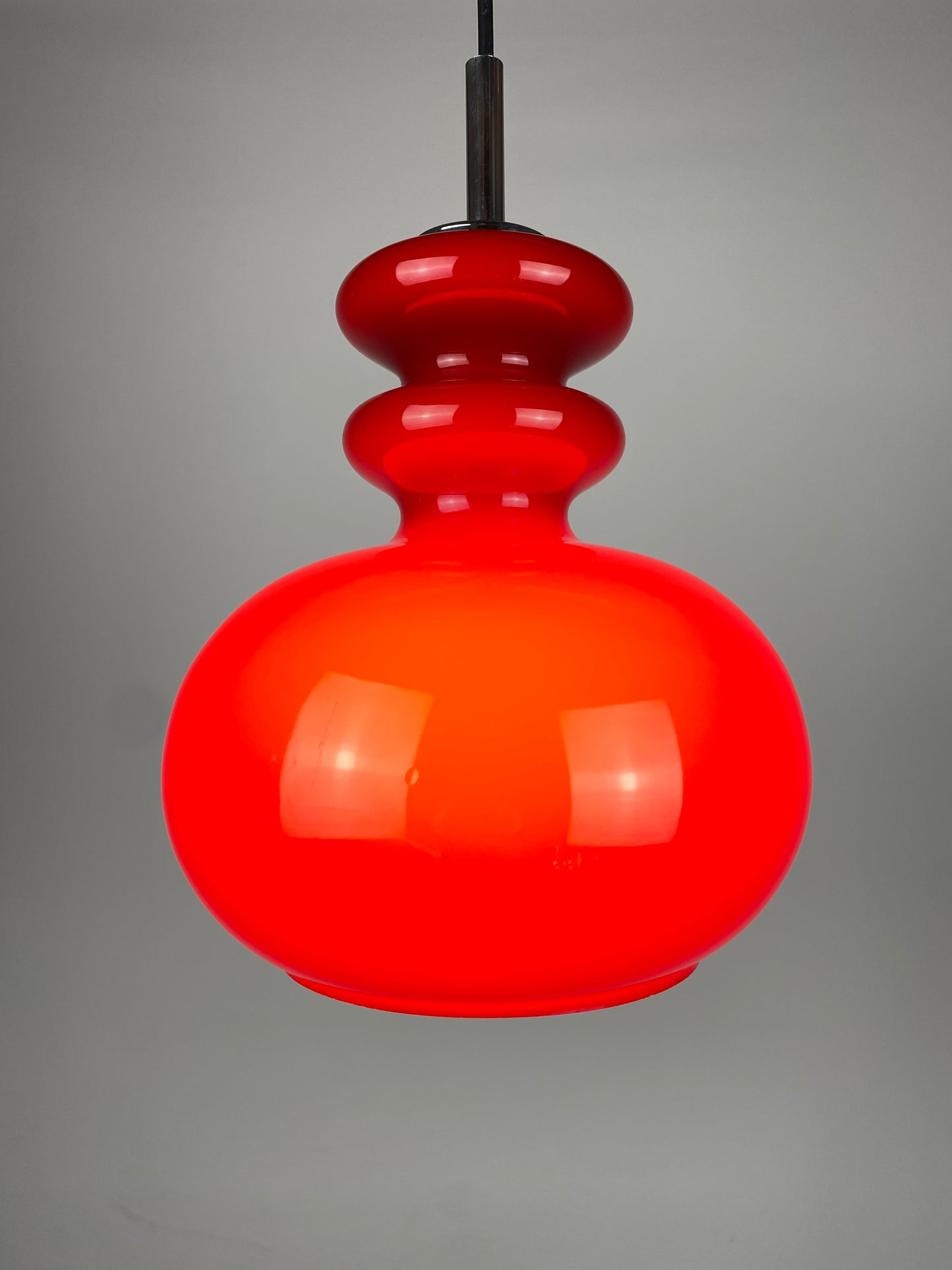 Red glass pendant light by Peill & Putzler, 1960