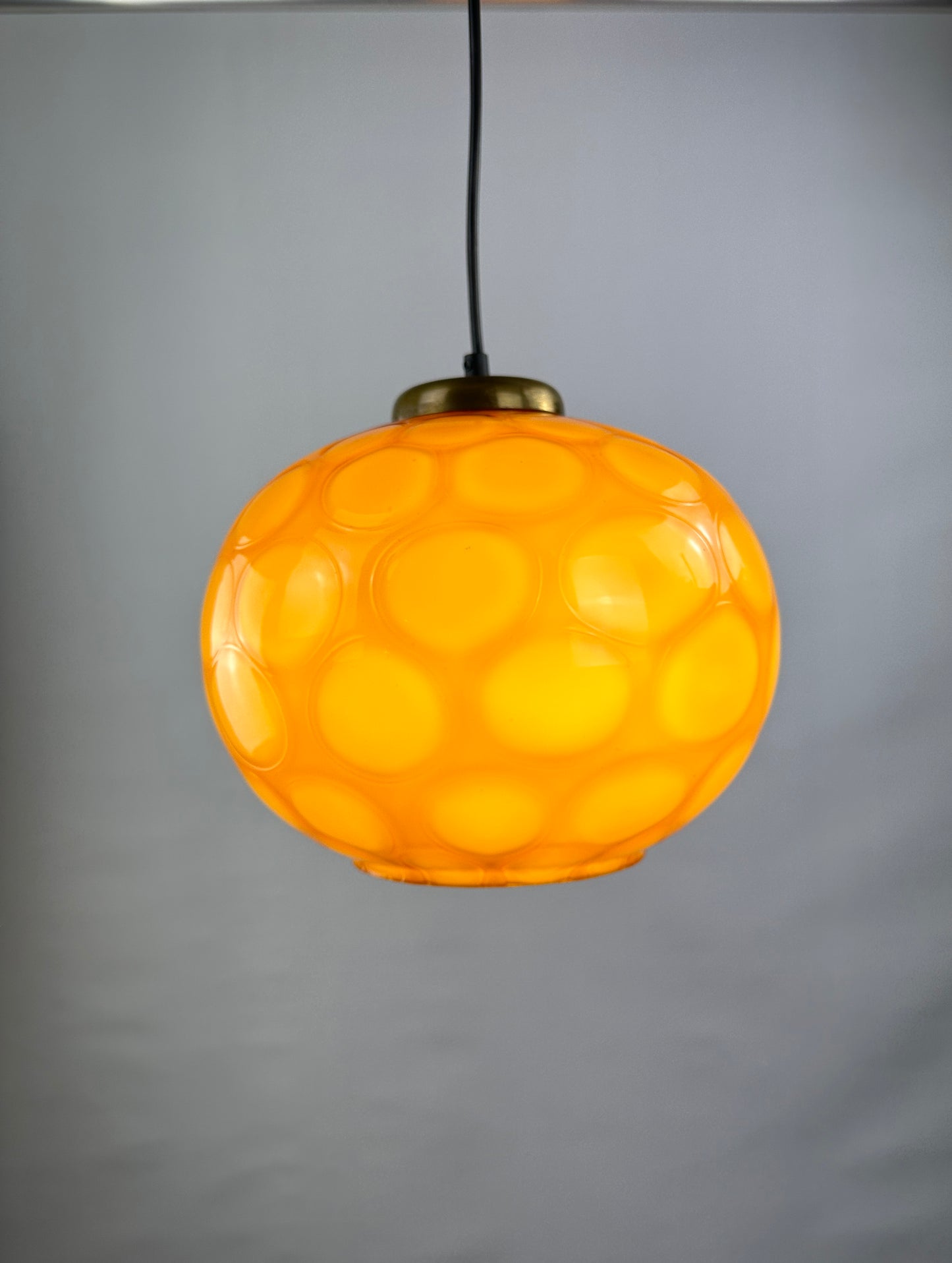 Caramel glass globe shaped pendant light from Germany, 1960