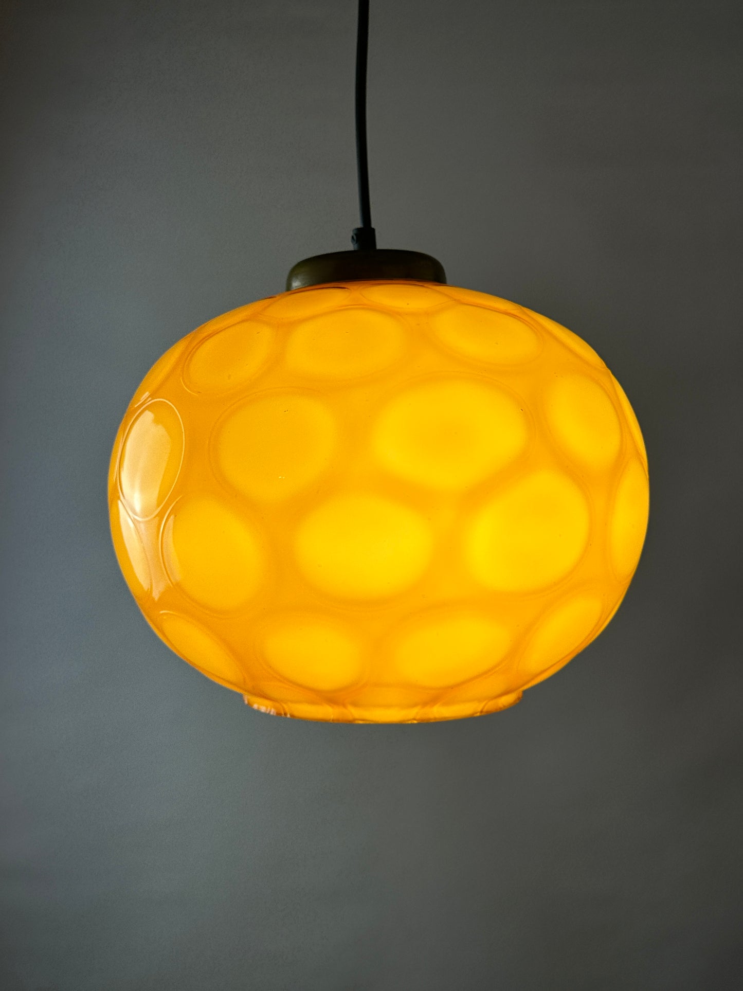 Caramel glass globe shaped pendant light from Germany, 1960