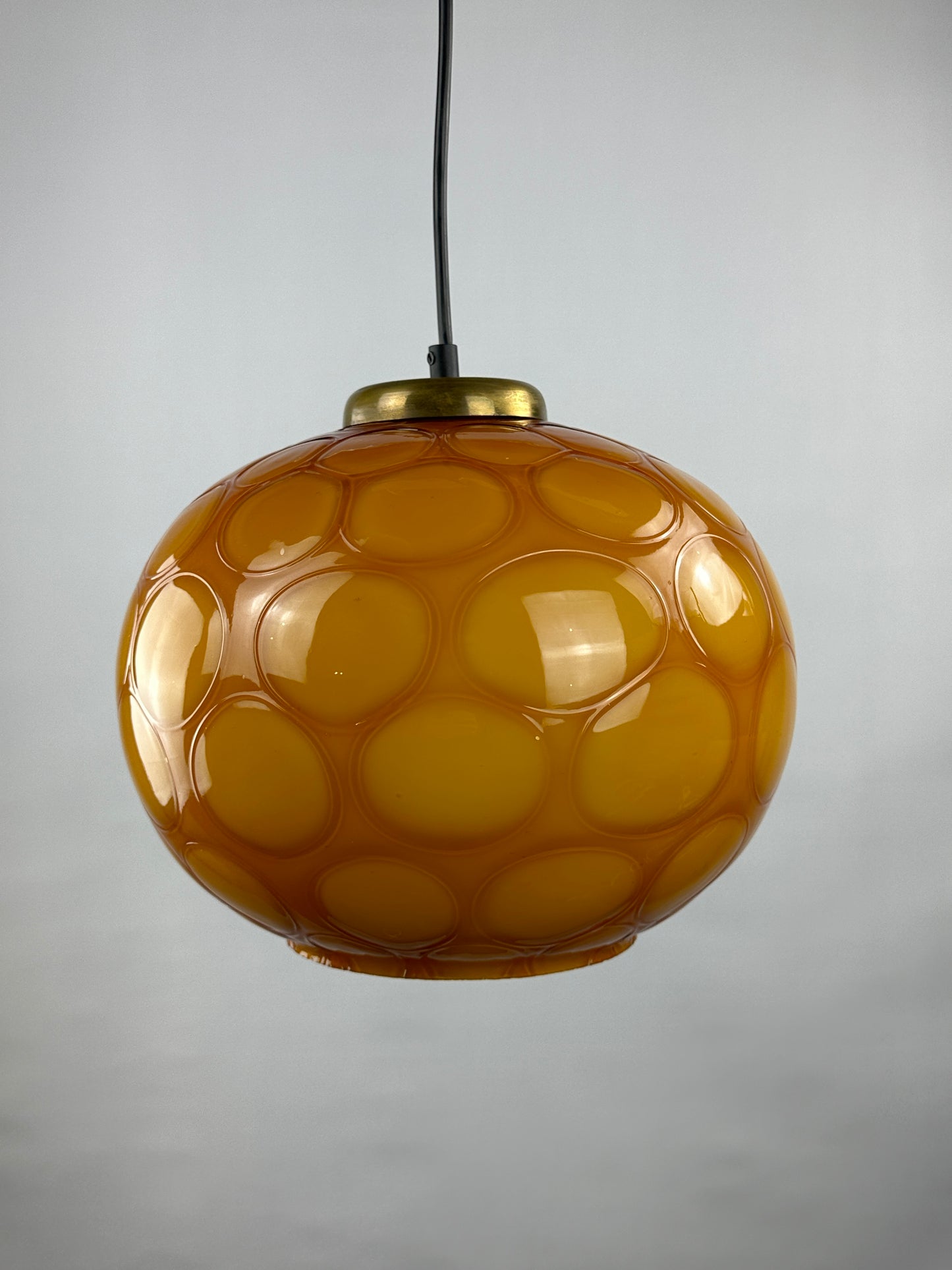 Caramel glass globe shaped pendant light from Germany, 1960