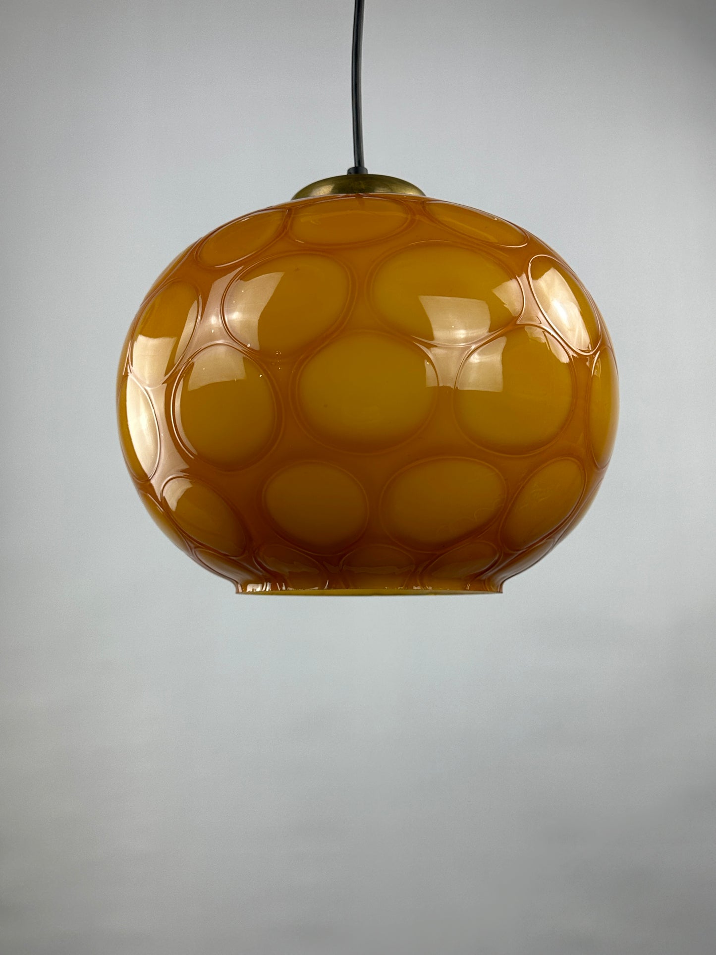 Caramel glass globe shaped pendant light from Germany, 1960