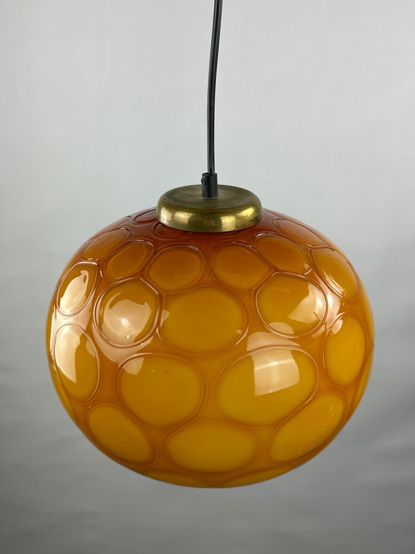 Caramel glass globe shaped pendant light from Germany, 1960