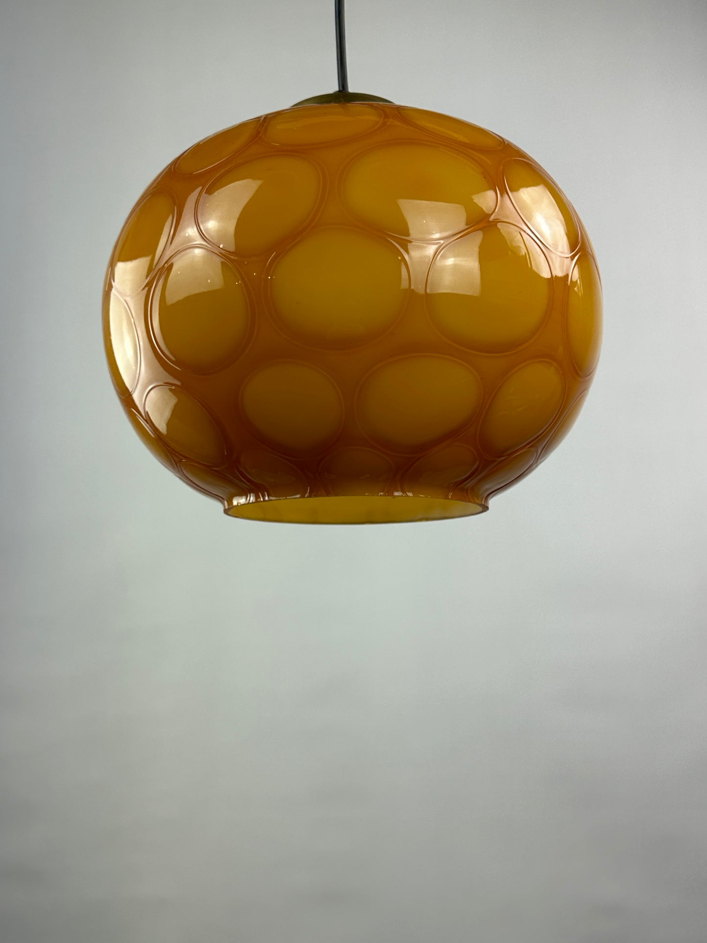 Caramel glass globe shaped pendant light from Germany, 1960