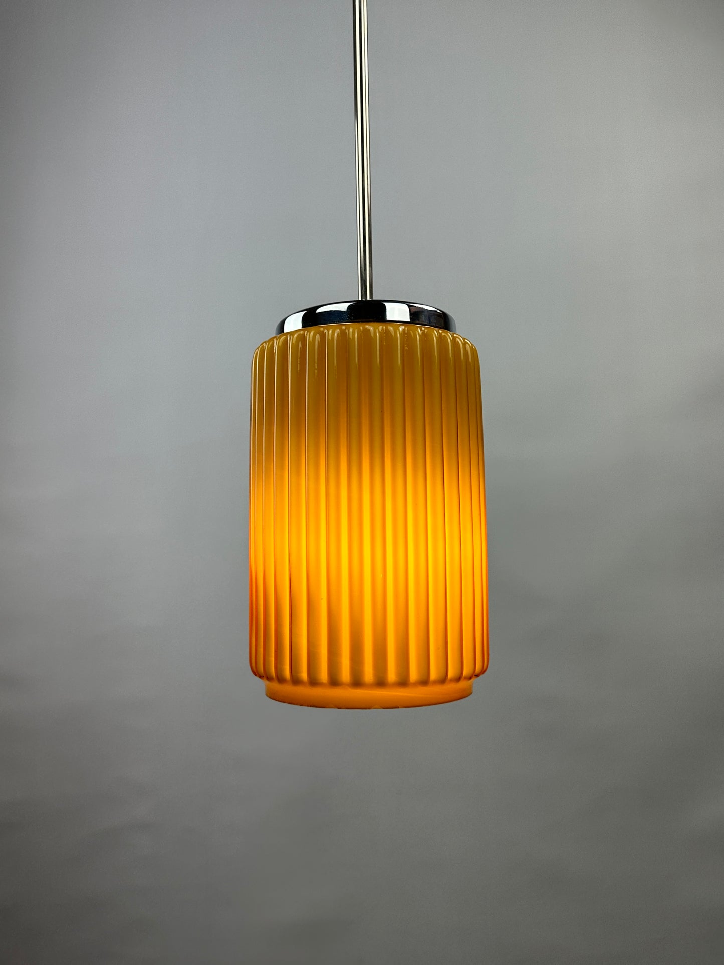 Caramel glass cilinder shaped pendant light from Germany, 1960