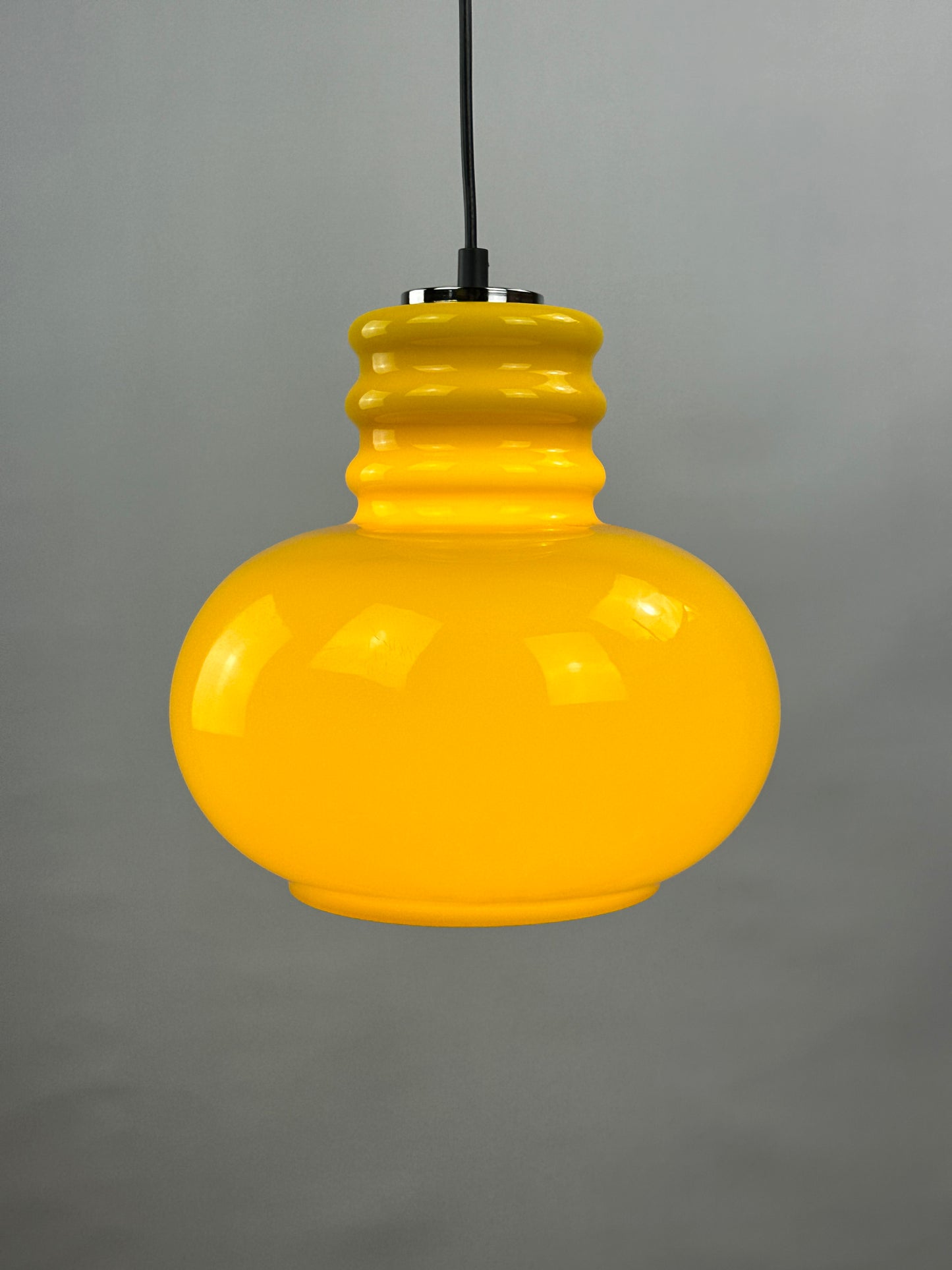 Yellow glass pendant light by Peill and Putzler 1960