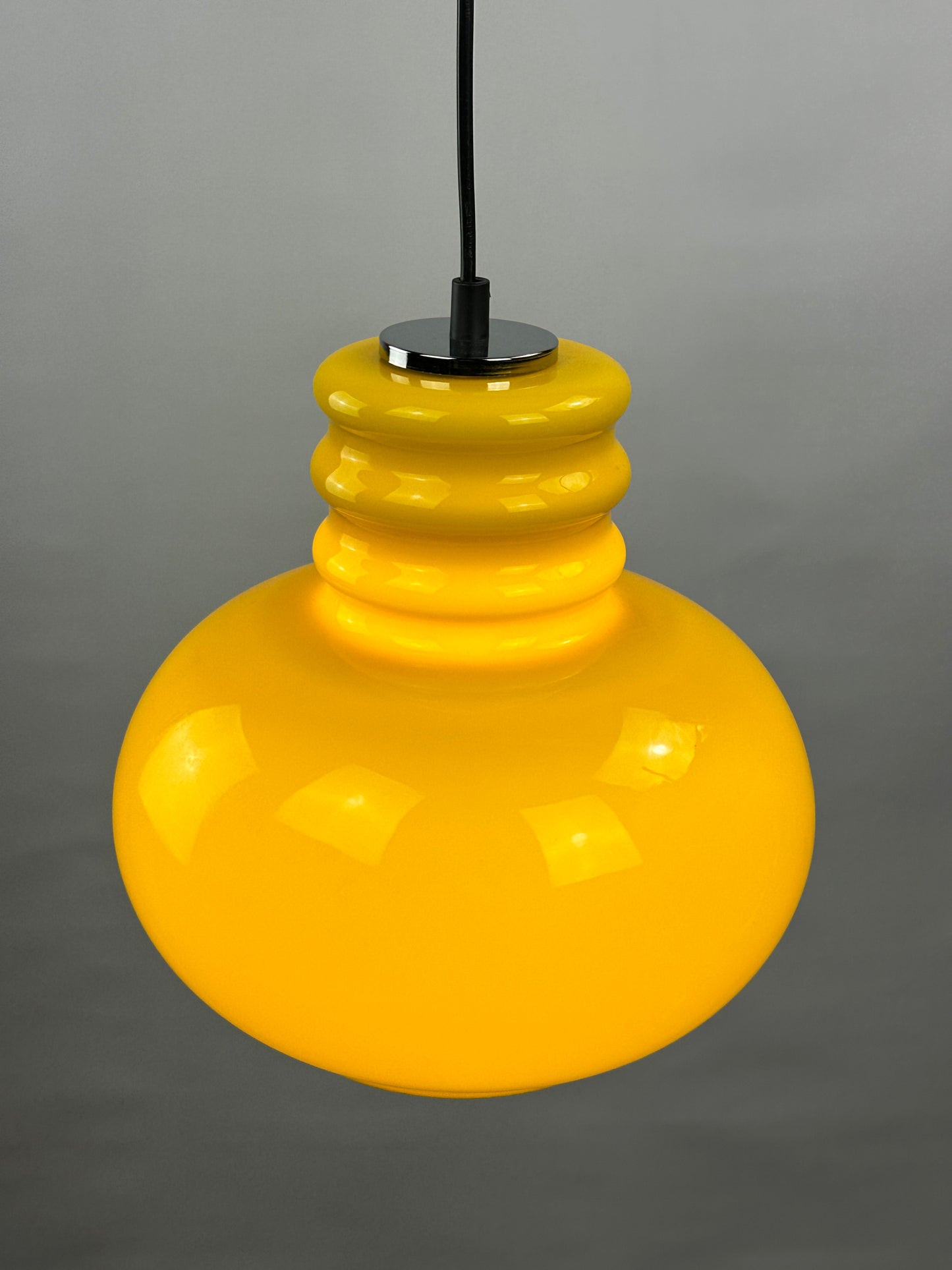 Yellow glass pendant light by Peill and Putzler 1960