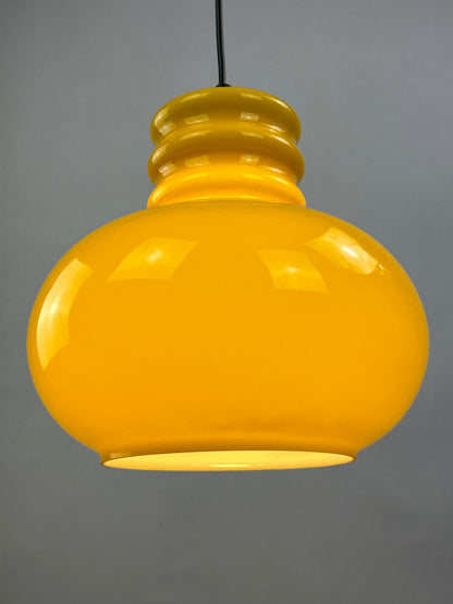 Yellow glass pendant light by Peill and Putzler 1960