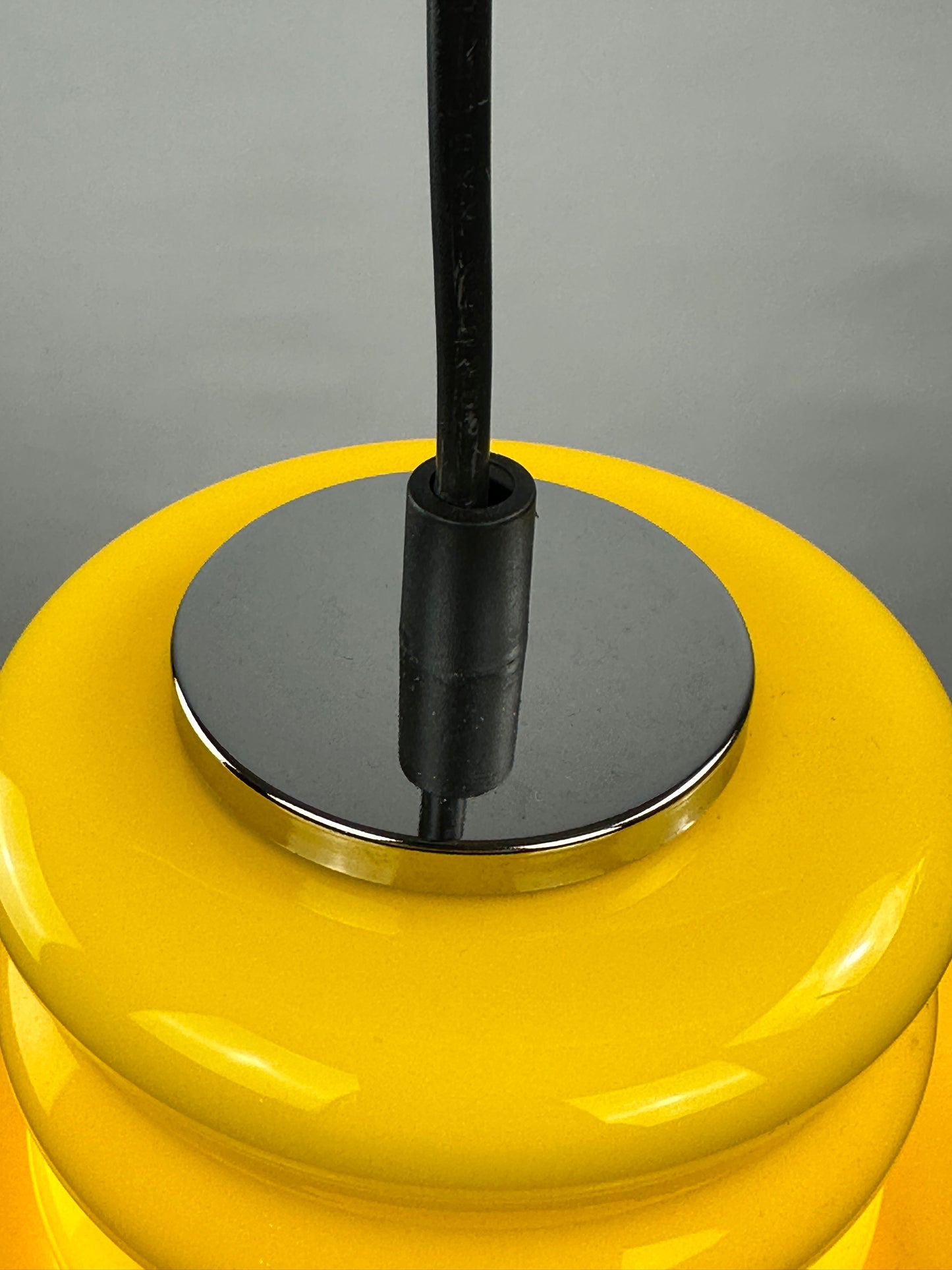 Yellow glass pendant light by Peill and Putzler 1960