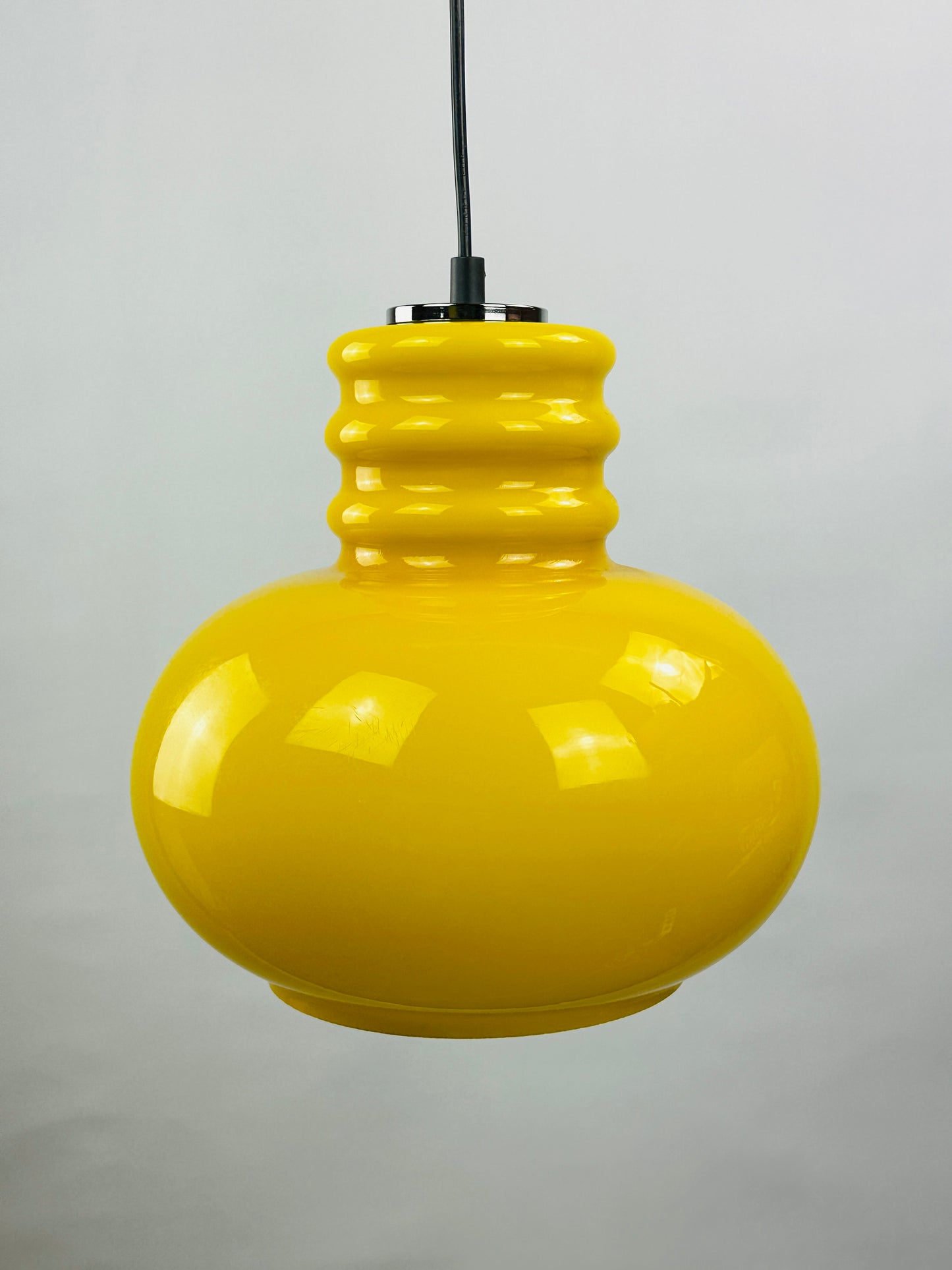 Yellow glass pendant light by Peill and Putzler 1960