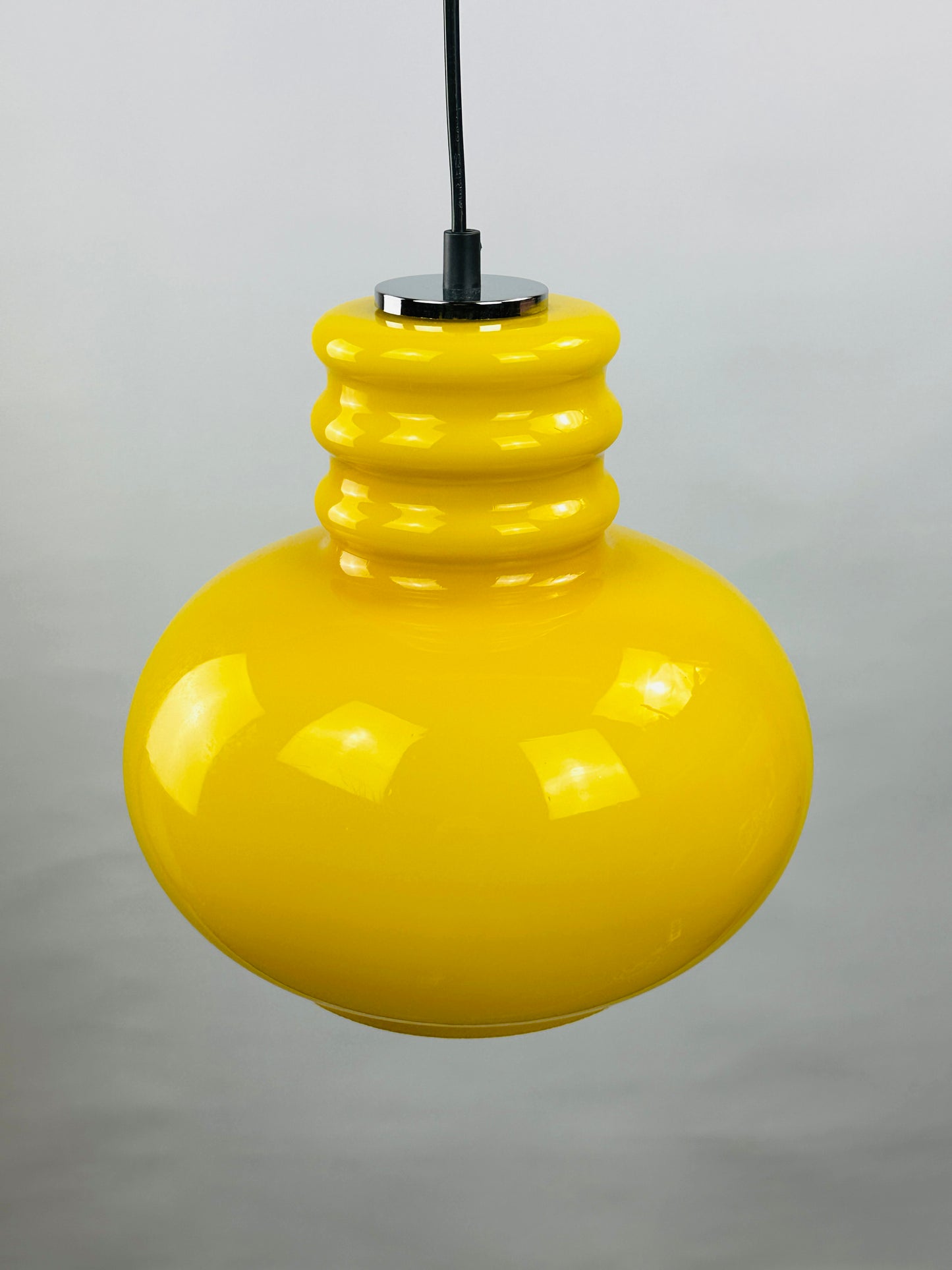 Yellow glass pendant light by Peill and Putzler 1960
