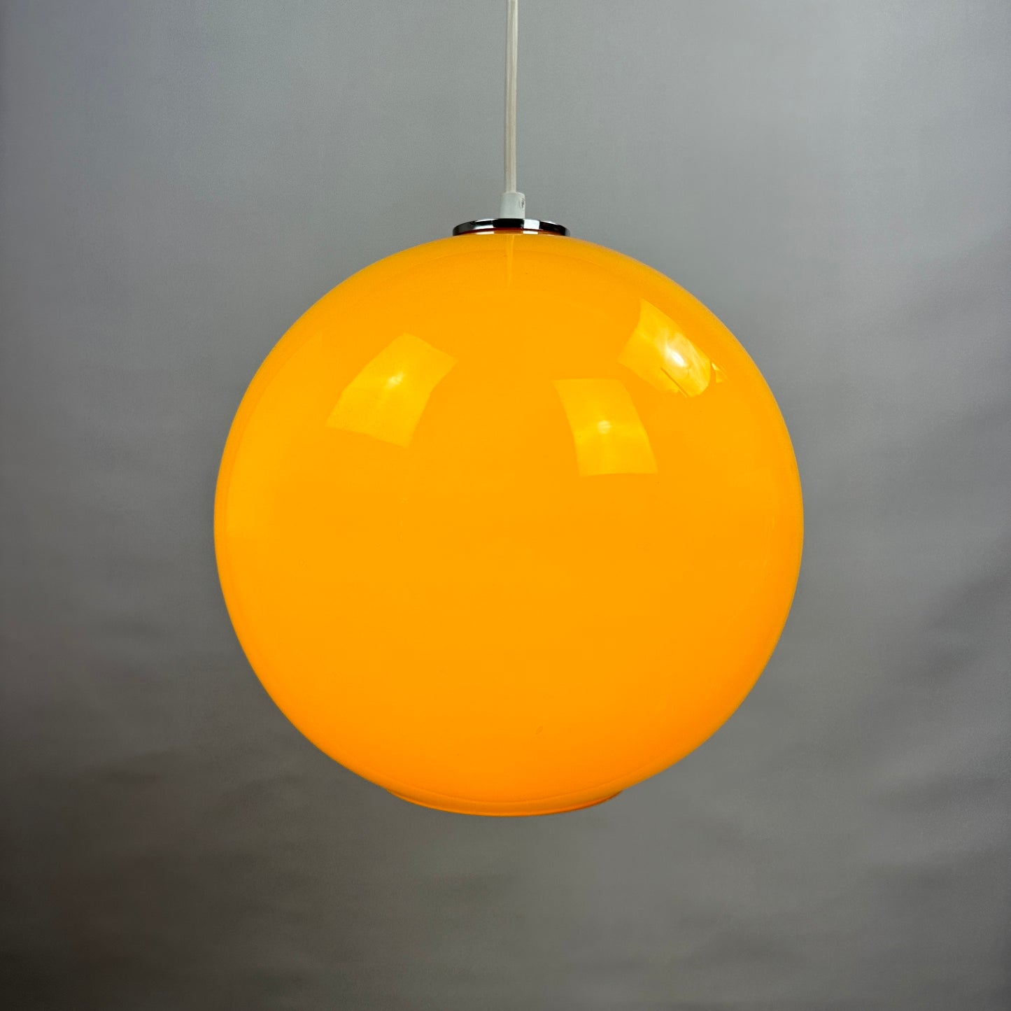 Yellow glass globe pendant light XL by Peill and Putzler 1960