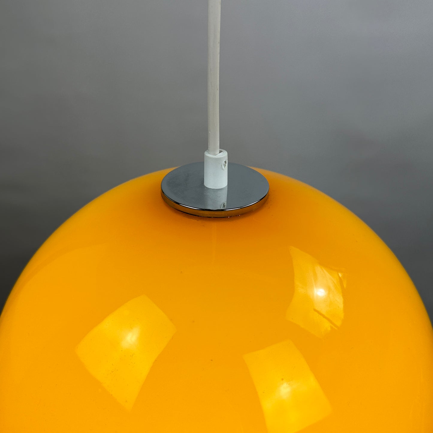 Yellow glass globe pendant light XL by Peill and Putzler 1960