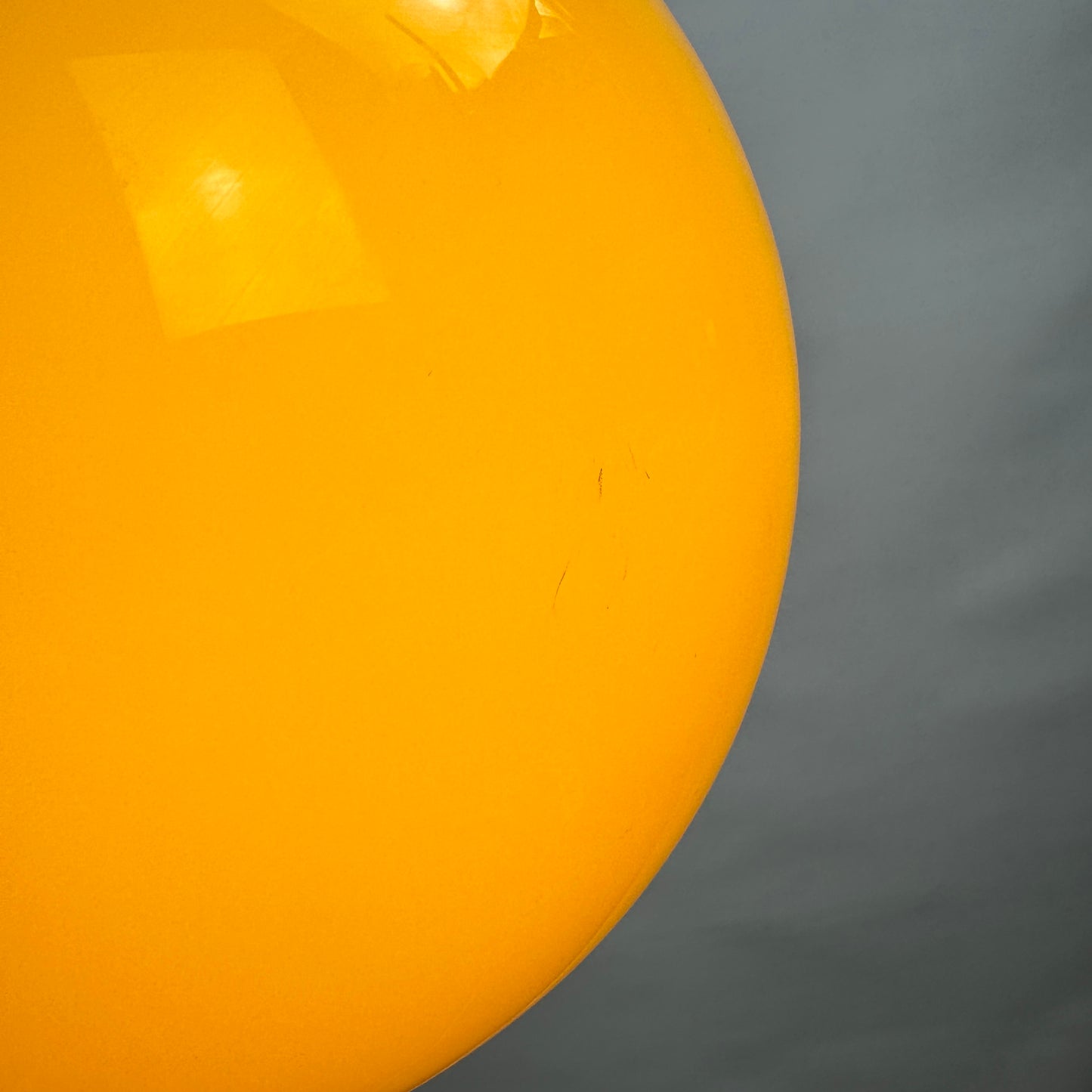 Yellow glass globe pendant light XL by Peill and Putzler 1960