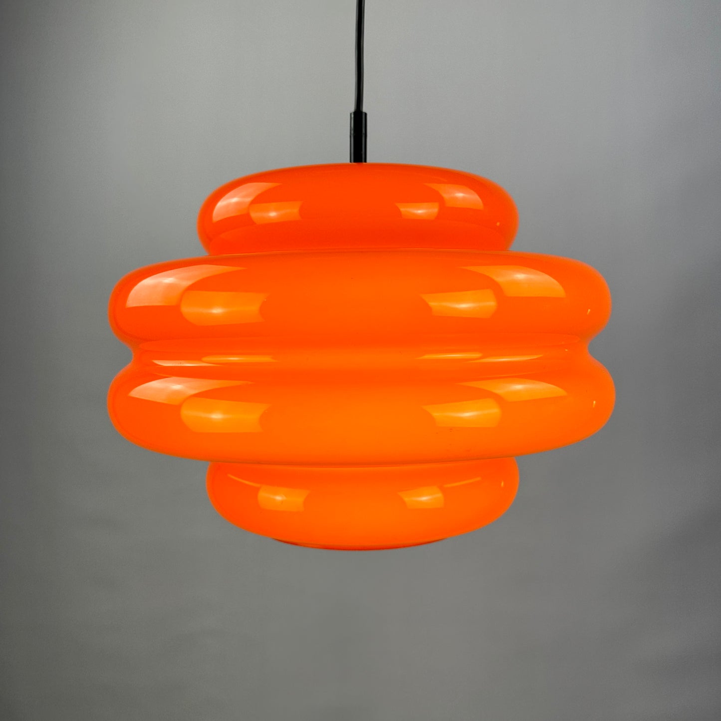 Rare bright orange glass pendant light by Peill and Putzler, 1960