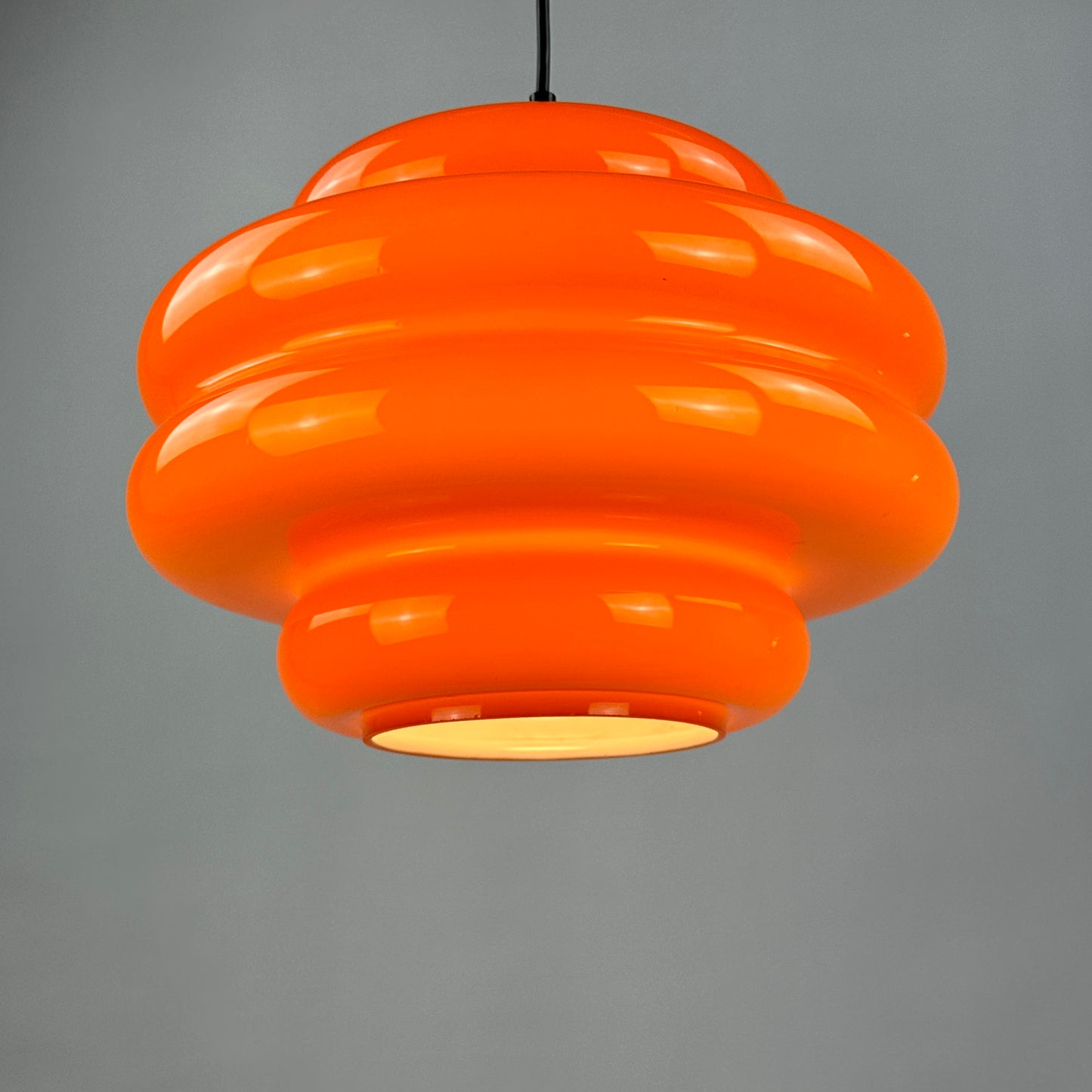 Rare bright orange glass pendant light by Peill and Putzler, 1960