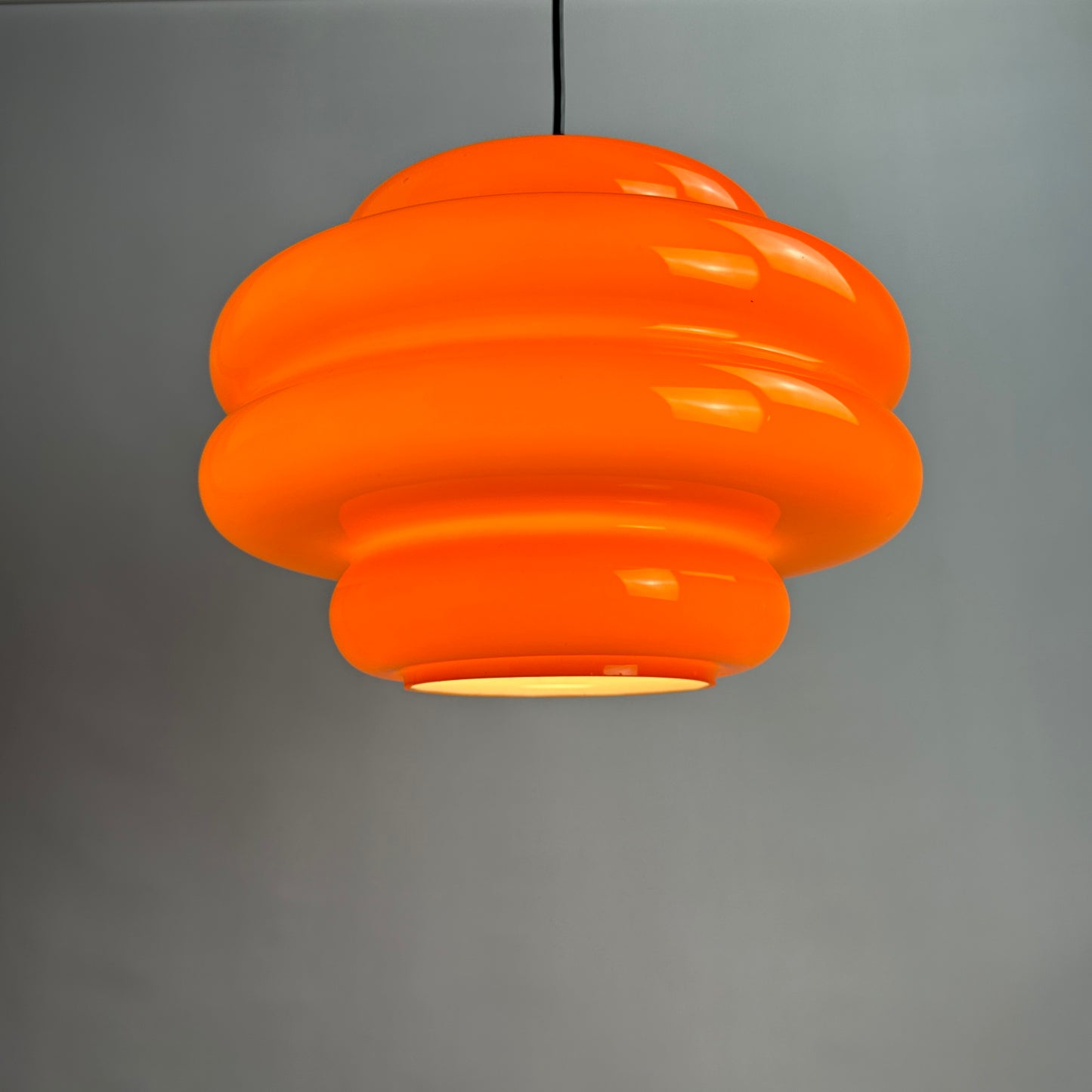 Rare bright orange glass pendant light by Peill and Putzler, 1960