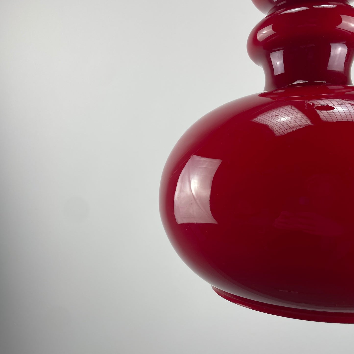Red glass pendant light by Peill and Putzler, 1960