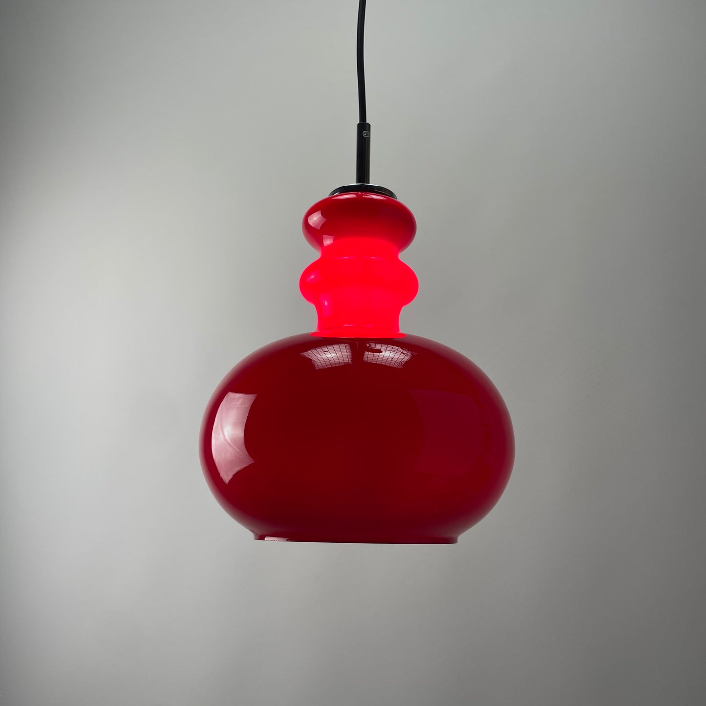Red glass pendant light by Peill and Putzler, 1960