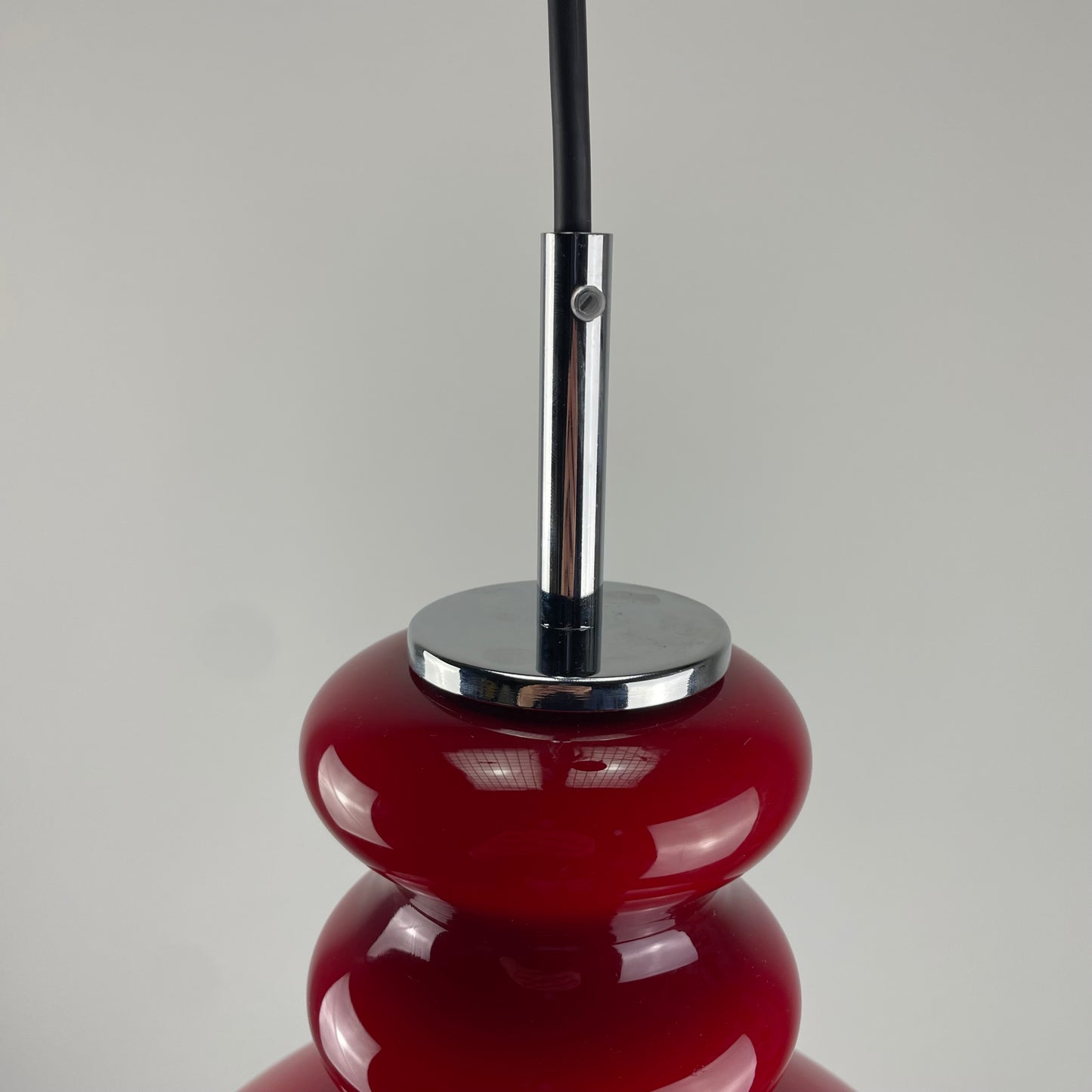 Red glass pendant light by Peill and Putzler, 1960