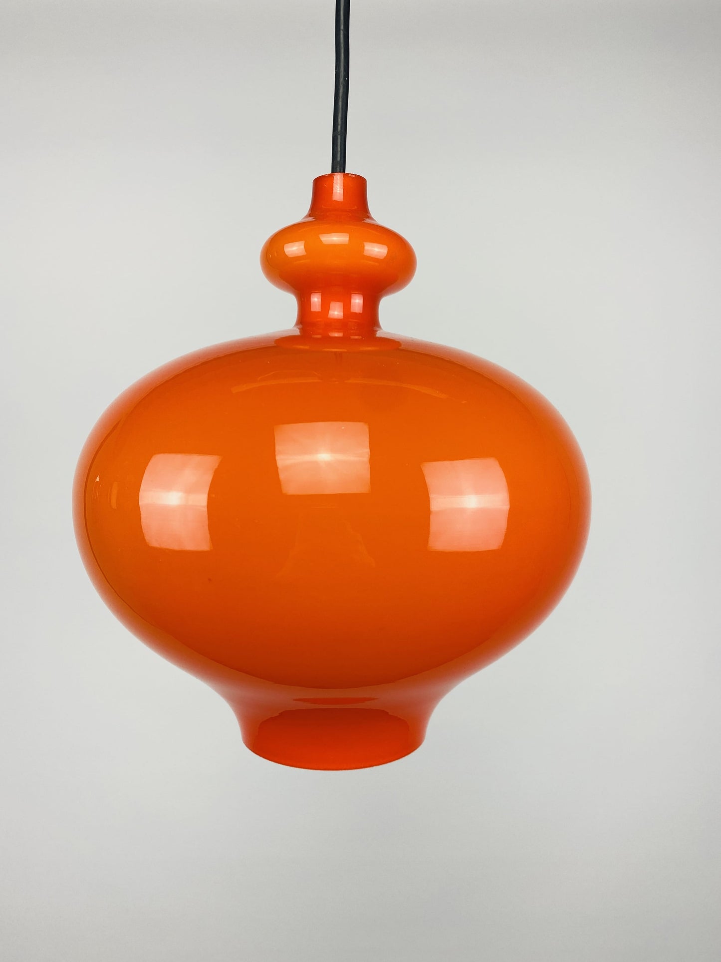 1 of 2 Swedish orange glass pendant light Oplight by Hans Agne Jakobsson for AB Markaryd