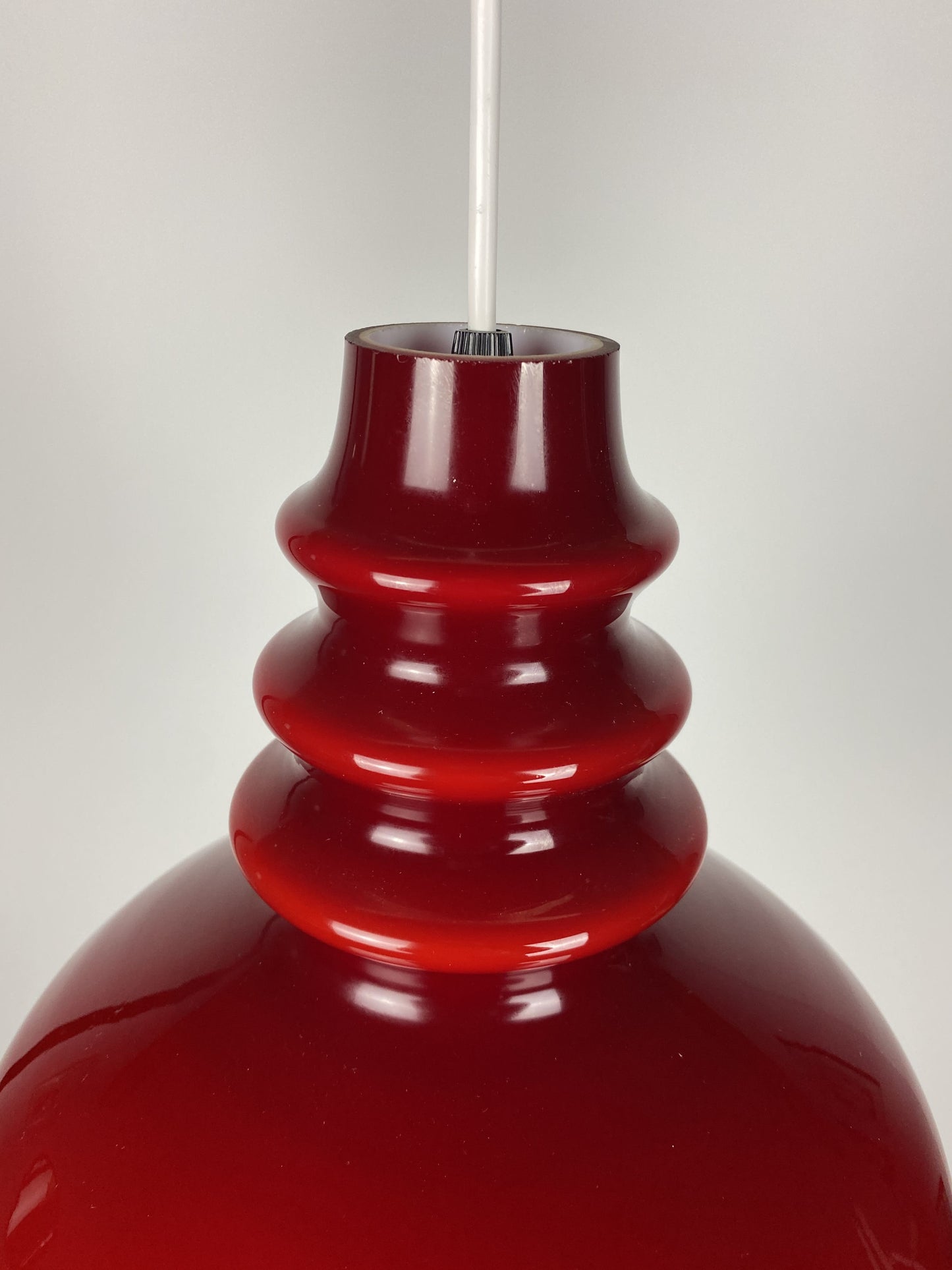 1 of 2 Dark red glass Peill & Putzler pendant light 1960