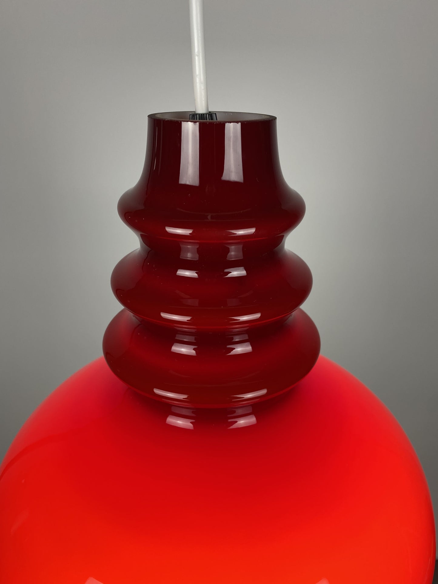 1 of 2 Dark red glass Peill & Putzler pendant light 1960