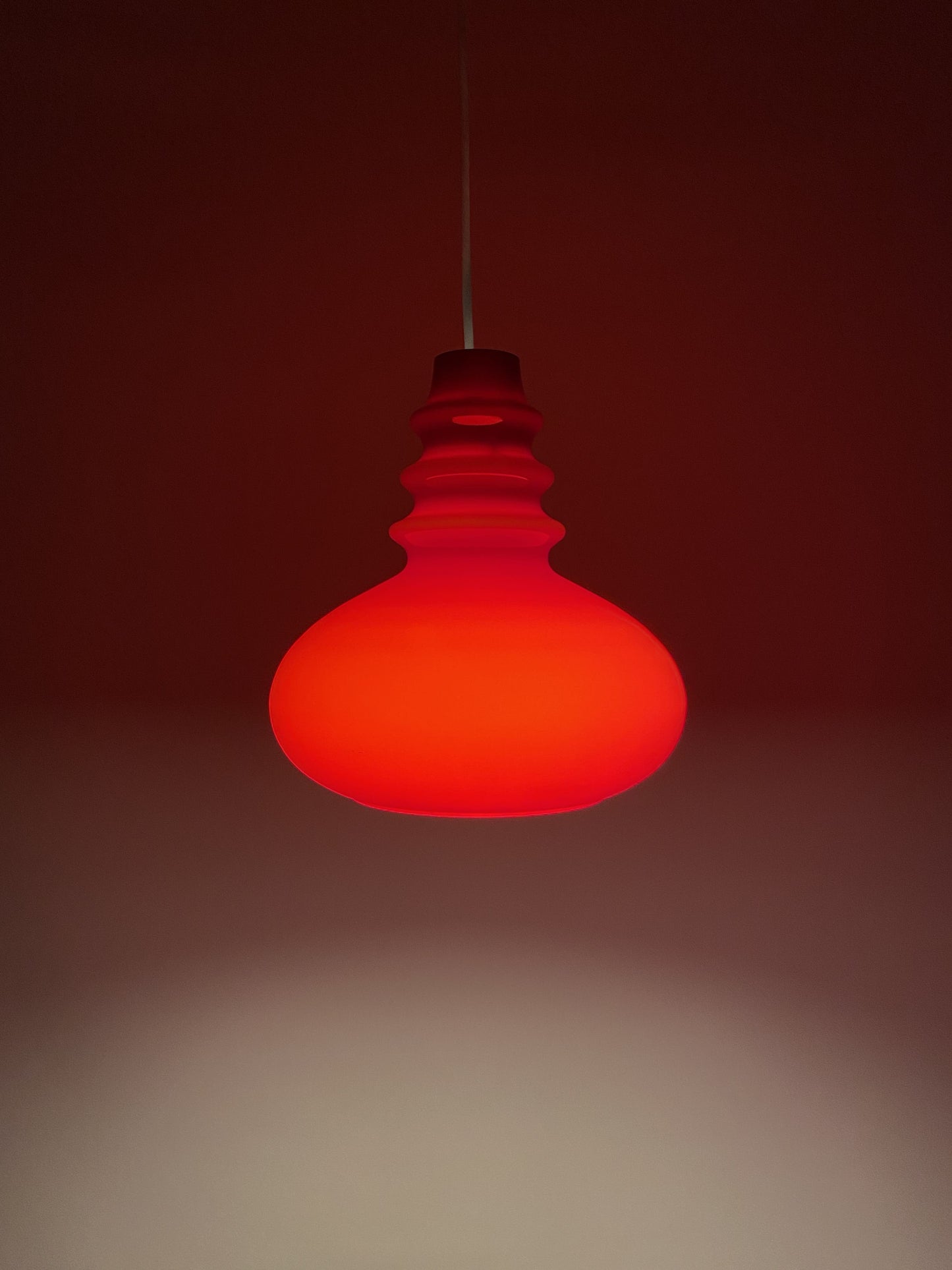 1 of 2 Dark red glass Peill & Putzler pendant light 1960