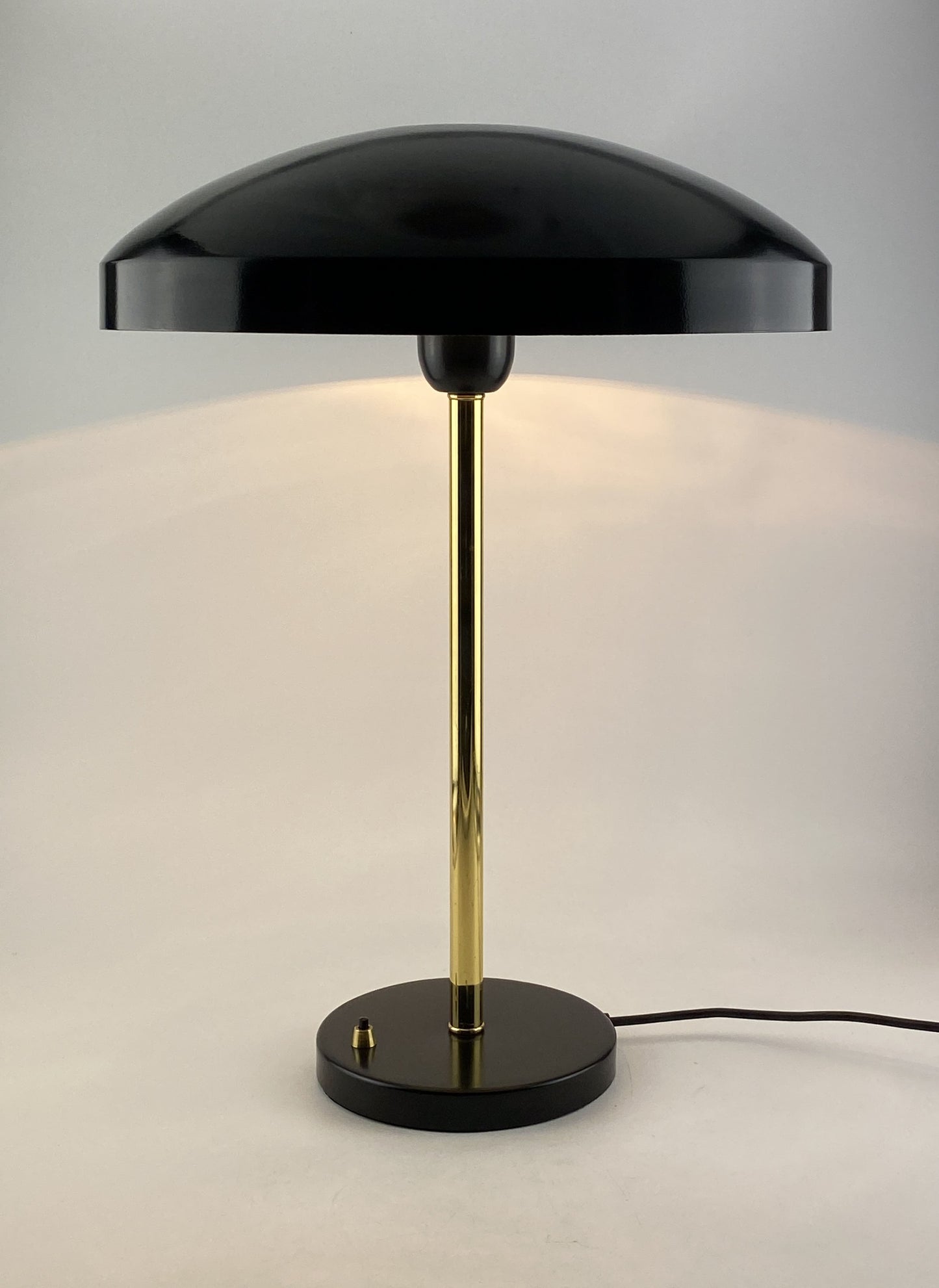 Rare black and gold table lamp UFO by Louis Kalff for Philips