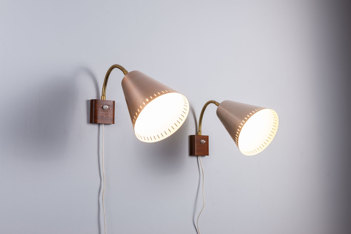 Danish wall lamps, mid-century modern lighting, teak and brass sconces, 1960s Scandinavian design, vintage adjustable lamps