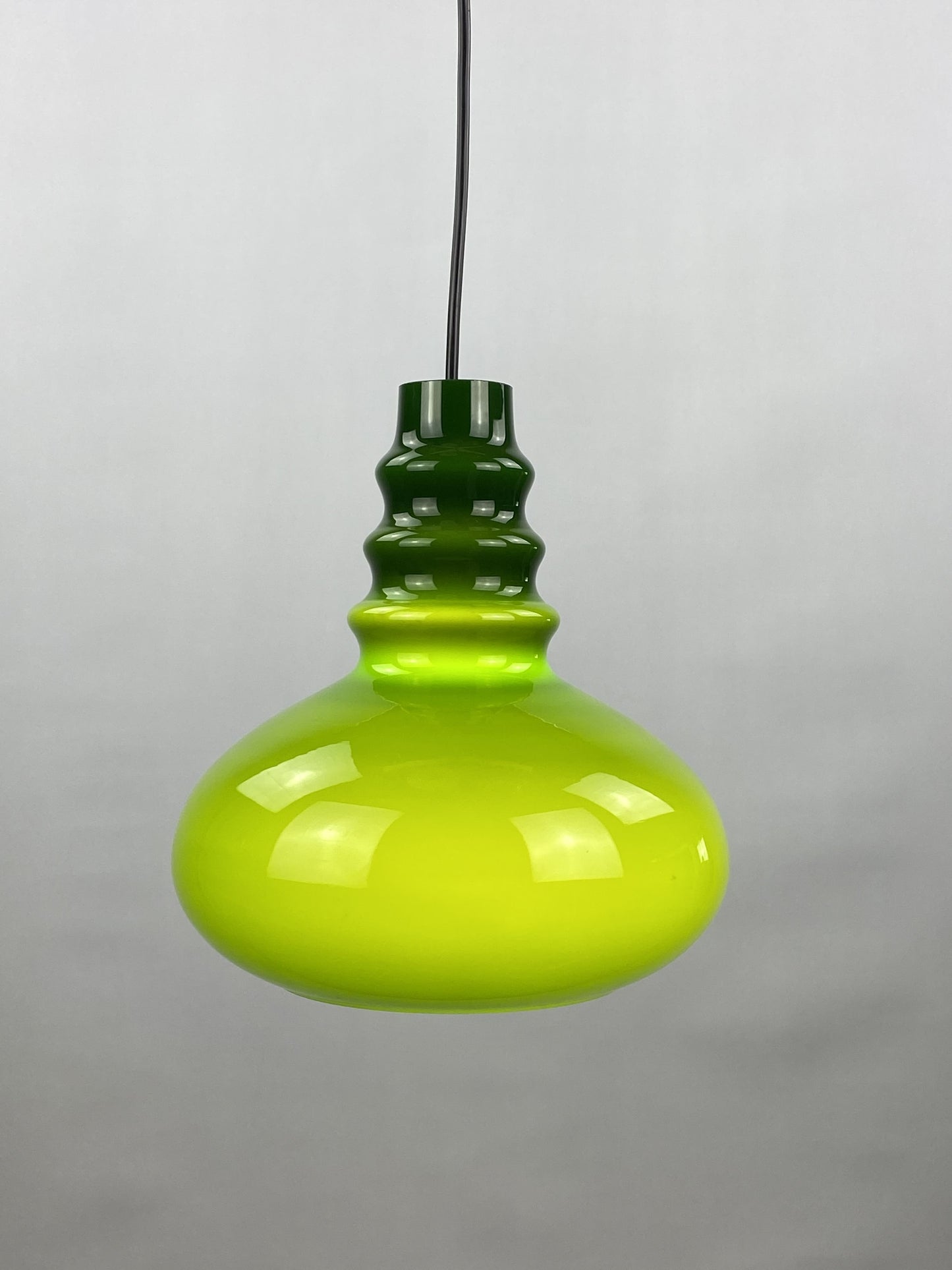 Rare dark green midcentury glass orange pendant light by Peill & Putzler 1960