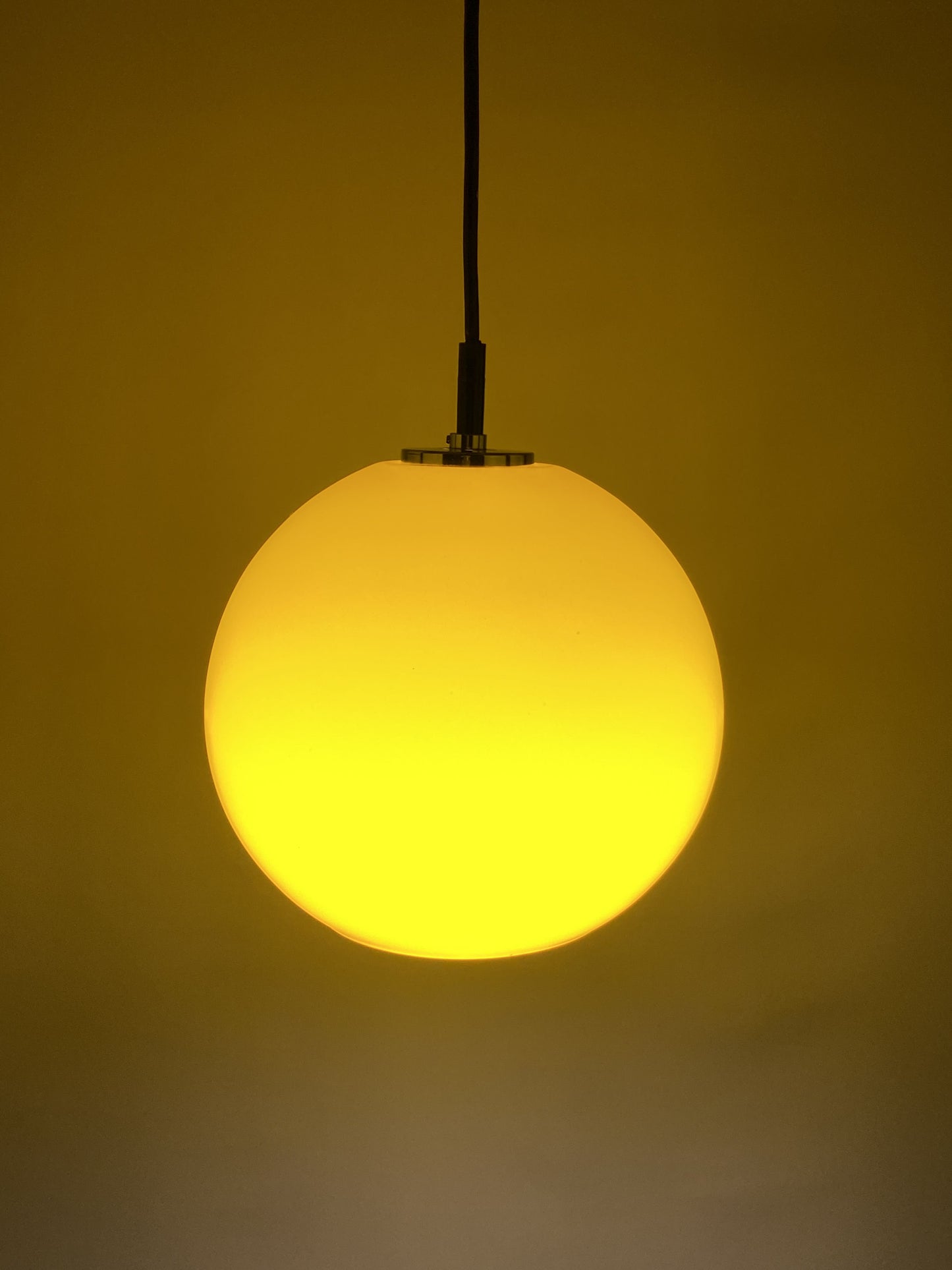 Yellow glass globe pendant light by Peill and Putzler 1960