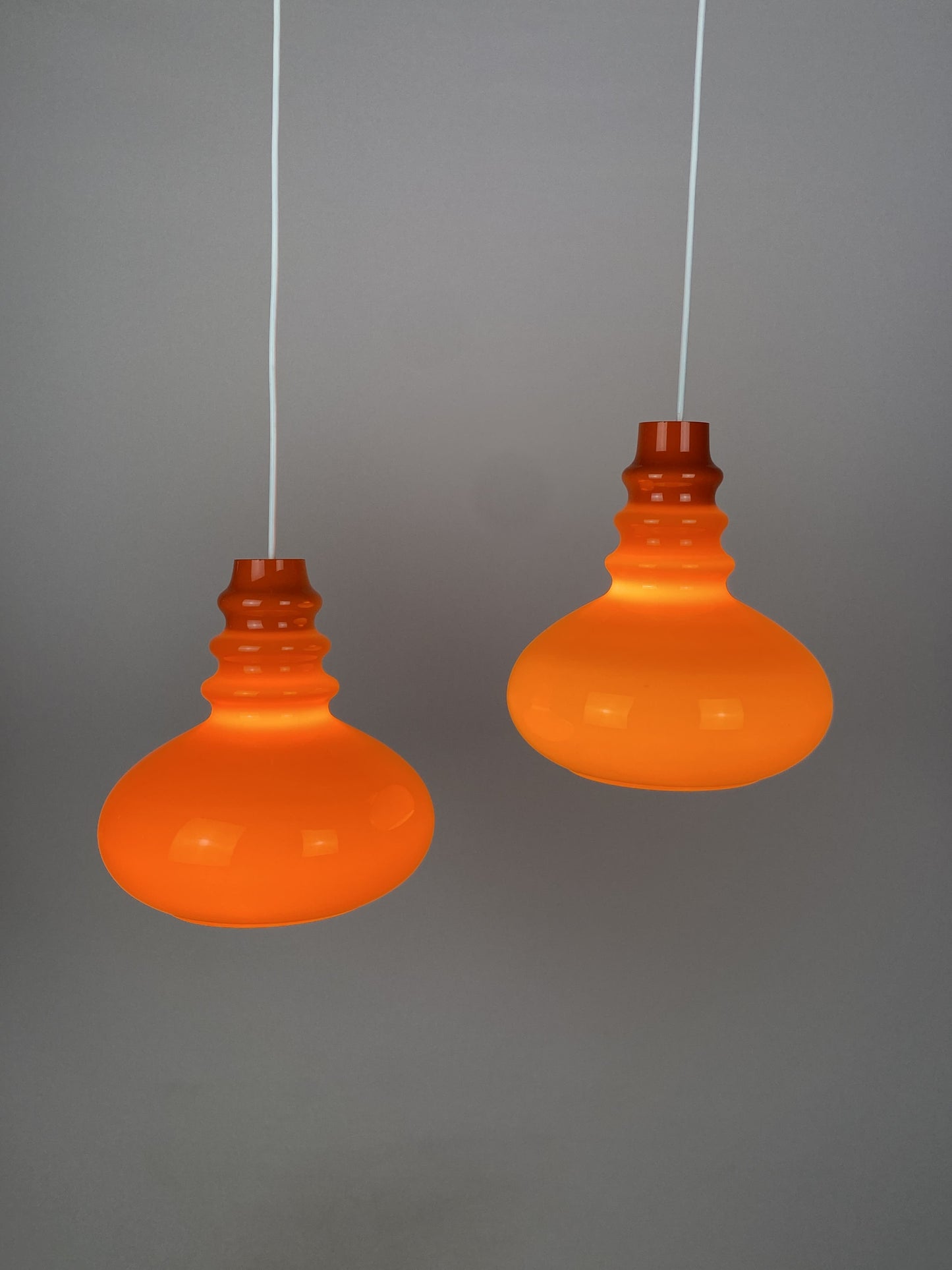 Orange midcentury glass pendant light by Peill & Putzler 1960