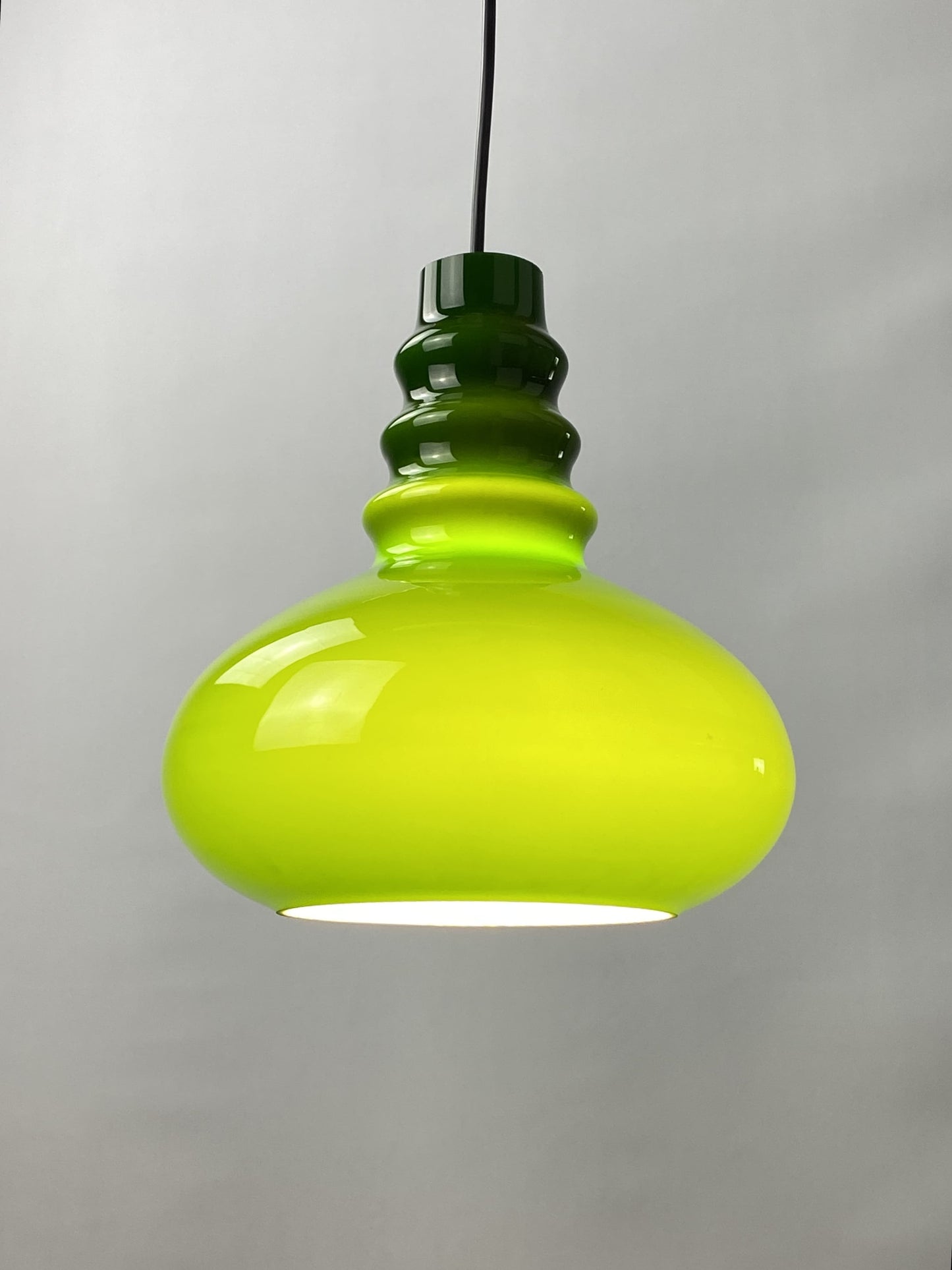 Rare dark green midcentury glass orange pendant light by Peill & Putzler 1960